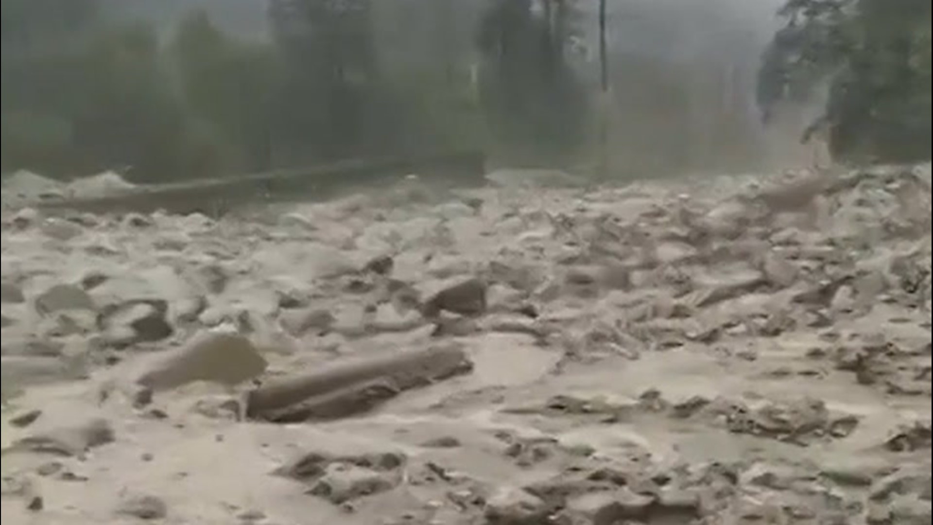 A road in Medog County, Tibet, was washed out as an intense mudslide raced through the area on Sept. 27. Days of heavy rain triggered the slide, which also washed out a bridge.