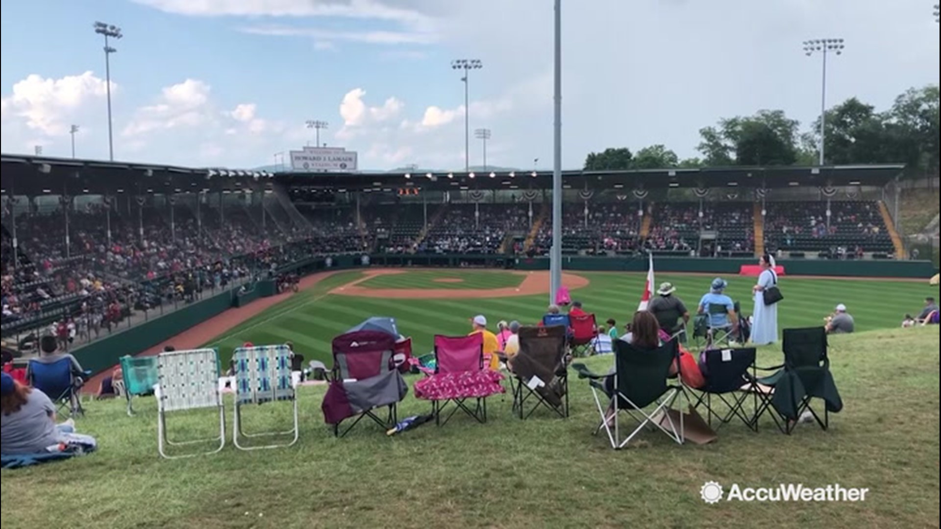 Baseball fans at the Little League World Series share their ideal weather conditions for watching baseball in Williamsport, Pennsylvania.