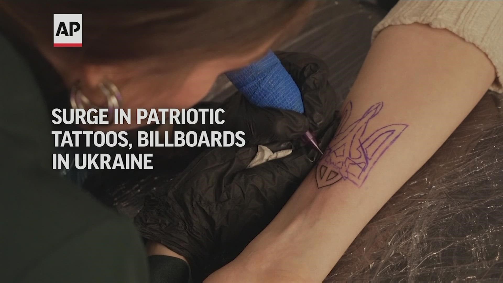 Patriotic tattoos, billboards popular in Ukraine 