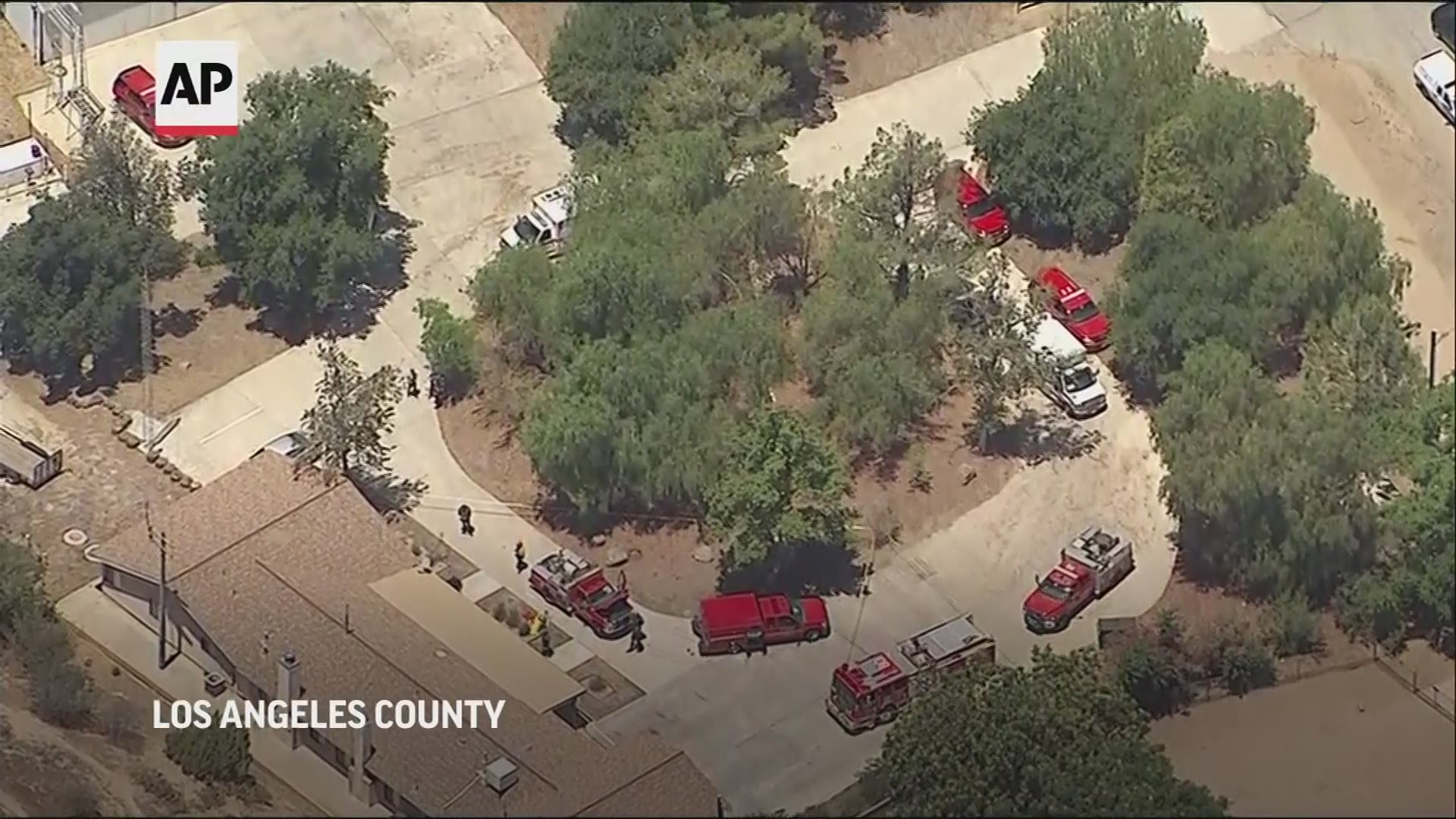 Authorities say a firefighter has killed a co-worker and wounded another at their small fire station in California’s second deadly workplace shooting this week.
