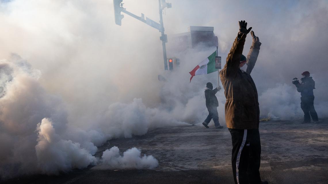 Protesters demand immigration agents leave Minneapolis after man is shot and killed during crackdown