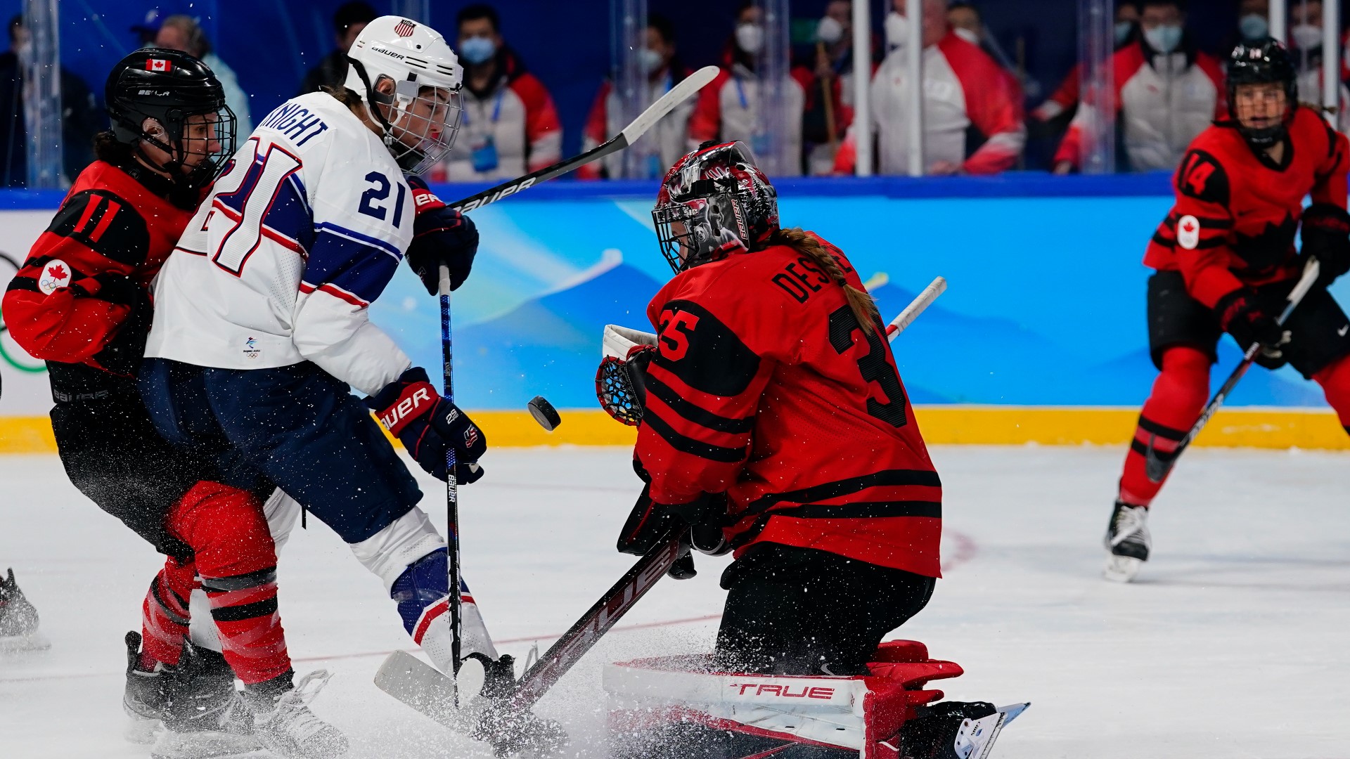 The U.S. and Canada renewed their fierce hockey rivalry for the gold medal. And the U.S. men's curling team's quest for back-to-back gold continues.