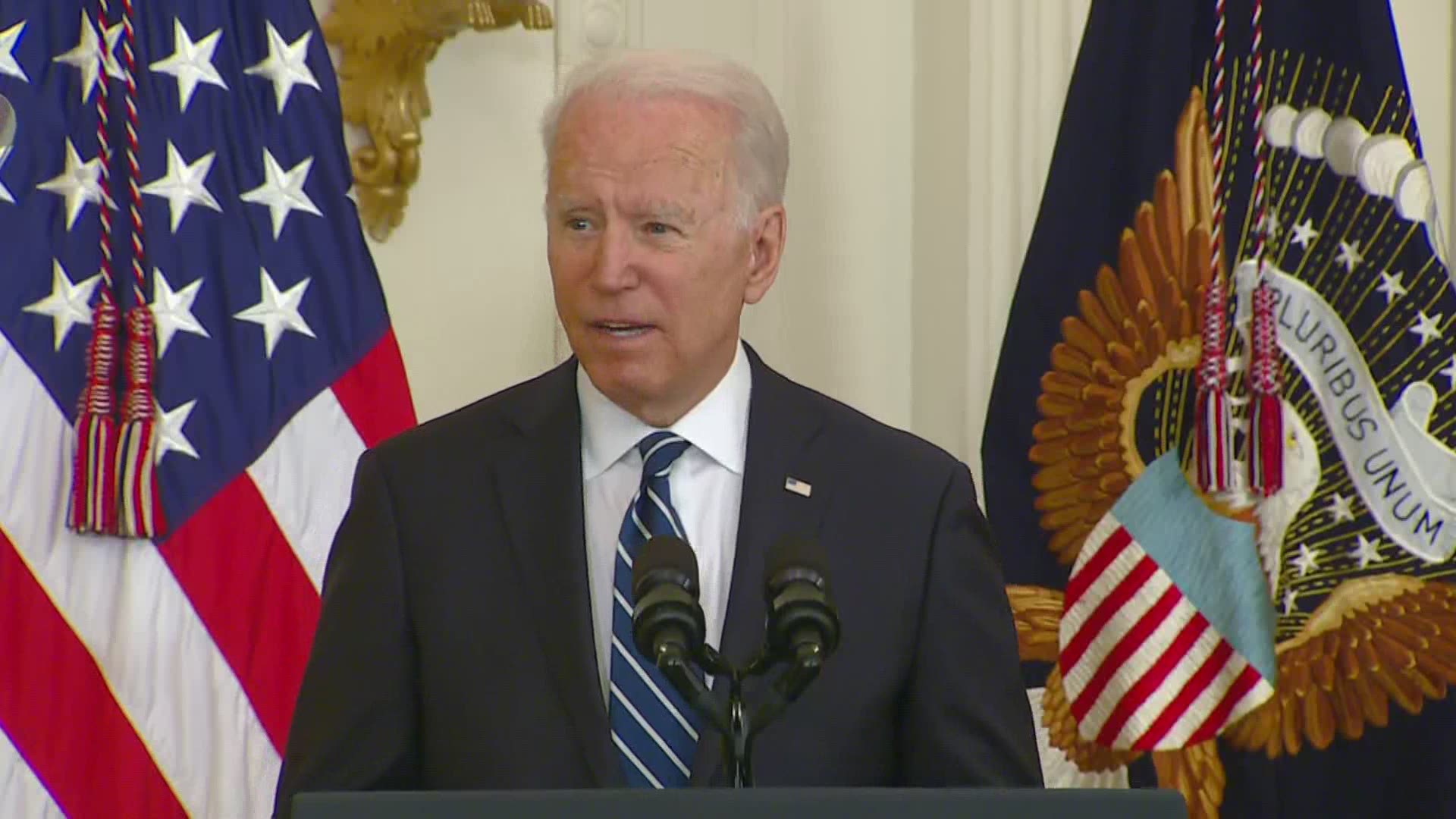 President Joe Biden hosted a naturalization ceremony Friday at the White House in which 21 immigrants became American citizens.