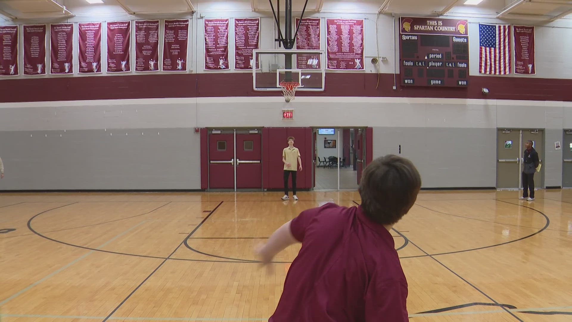 Y De Smet Jesuit High School freshman Aiden, born with Down syndrome, sent the gym into a frenzy the other night when he casually made a basket from half-court