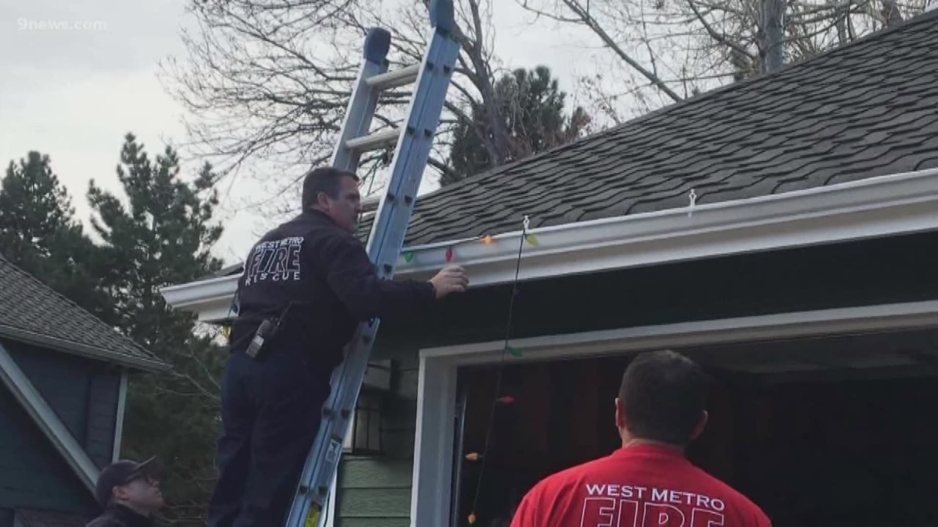Firefighters hang lights after 