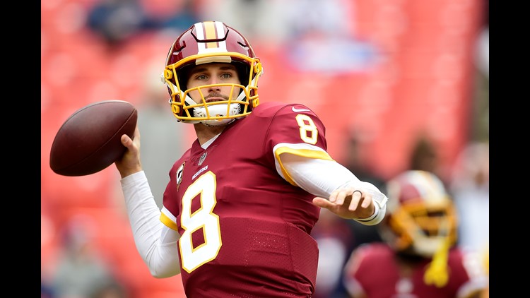 Kirk Cousins of the Minnesota Vikings warms up before the game