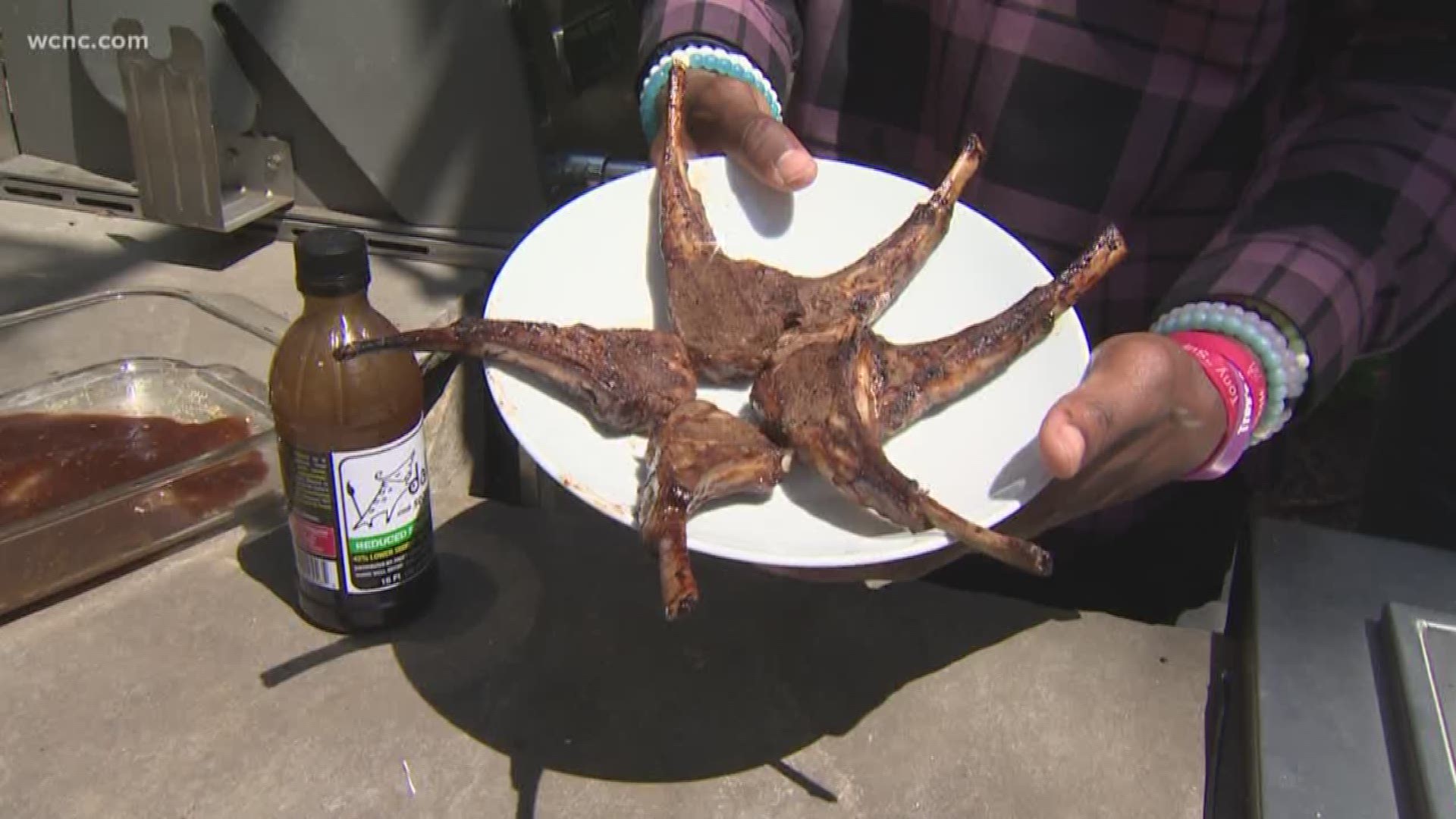 Devin Funches  fires up the grill and show us how to make lamb chops
