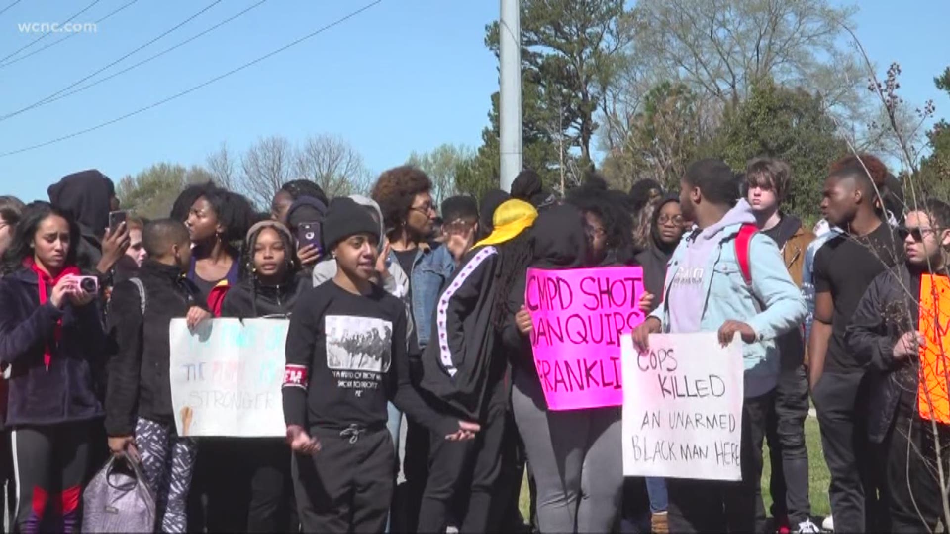 About 100 students from Northwest School of the Arts walked out of class just days after a CMPD police officer shot and killed Danquoiors Franklin in the parking lot of the Burger King just up the street from the school.