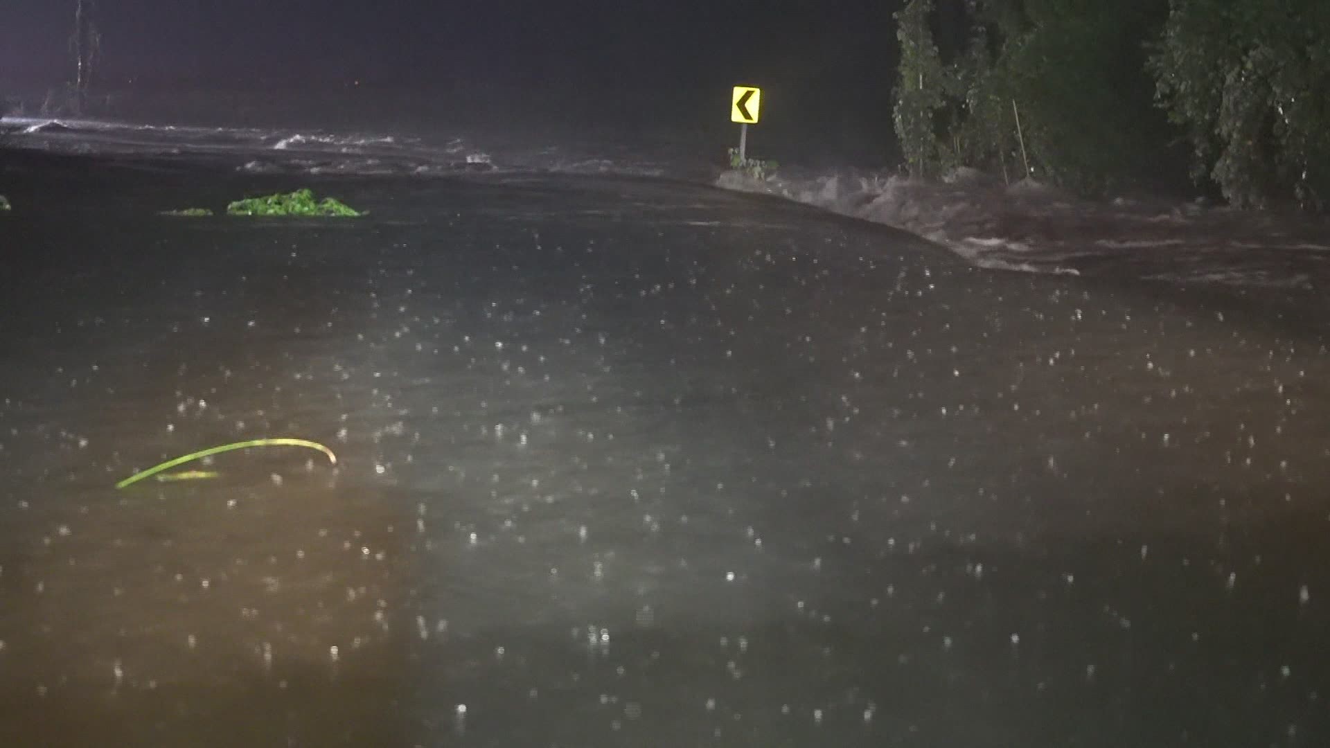 A North Carolina mother was rescued but two children are missing after their car was swept away by floodwaters early Tuesday morning.