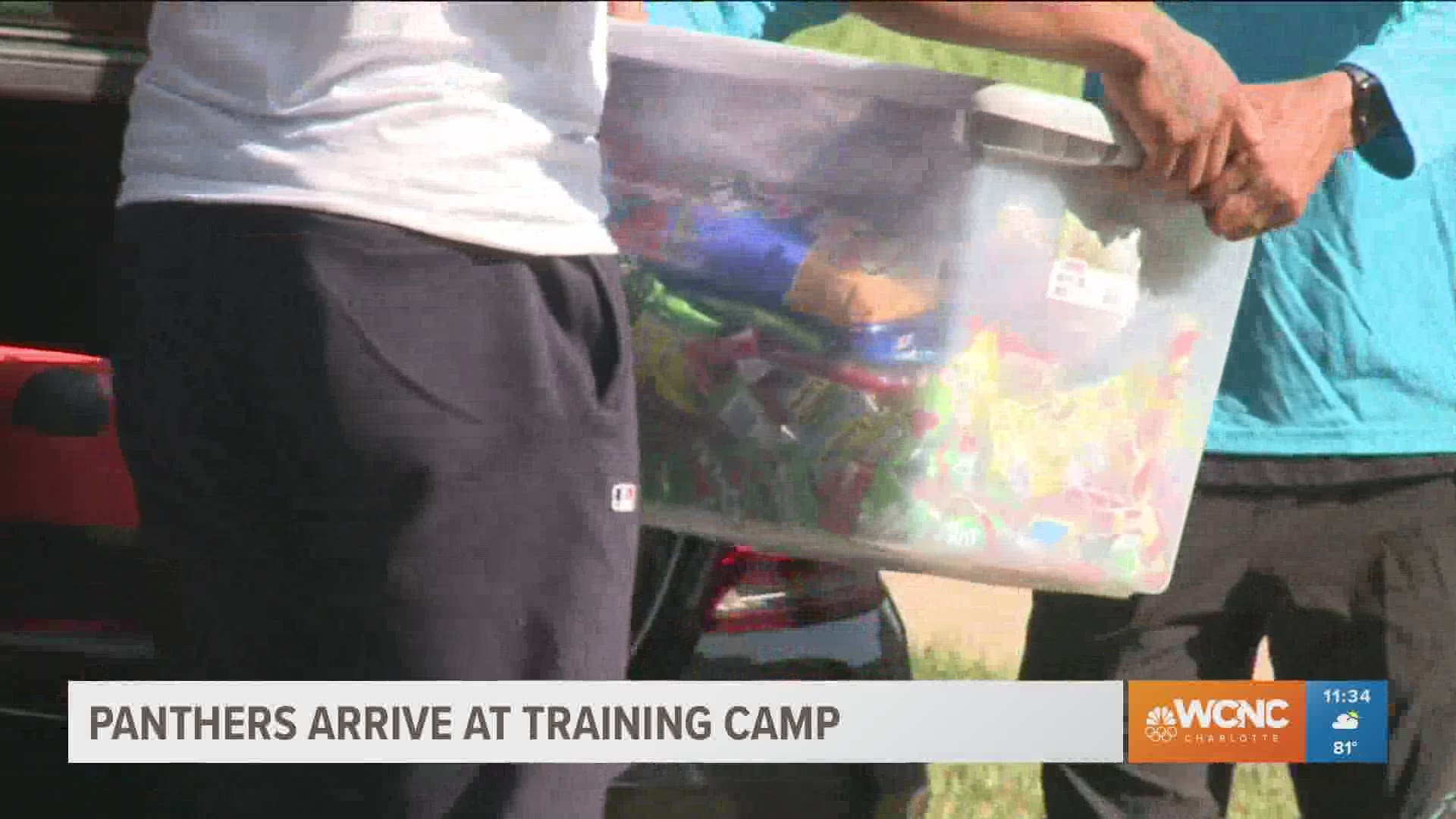 Carolina Panther wide receiver DJ Moore showed up at training camp Tuesday carrying a huge bin of candy.