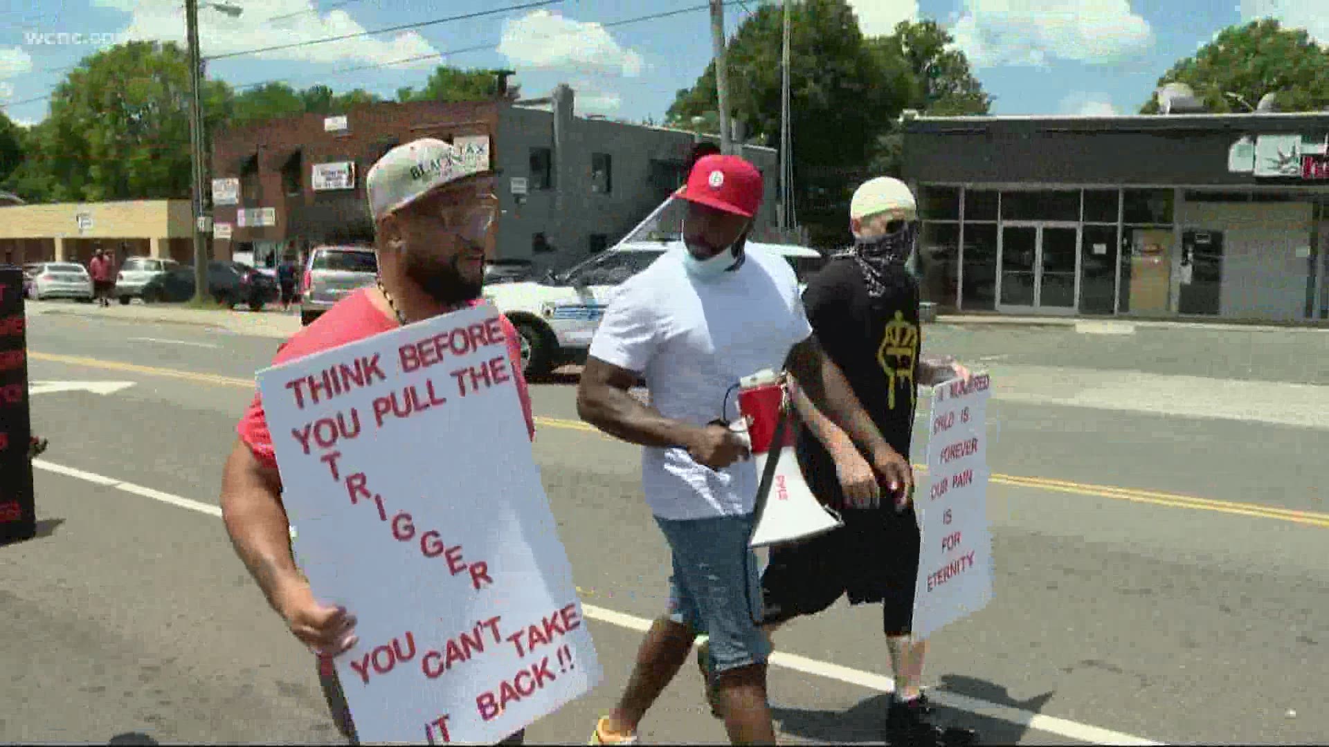 Dozens of people marched on Beatties Ford Road and Lasalle around noon on Friday.