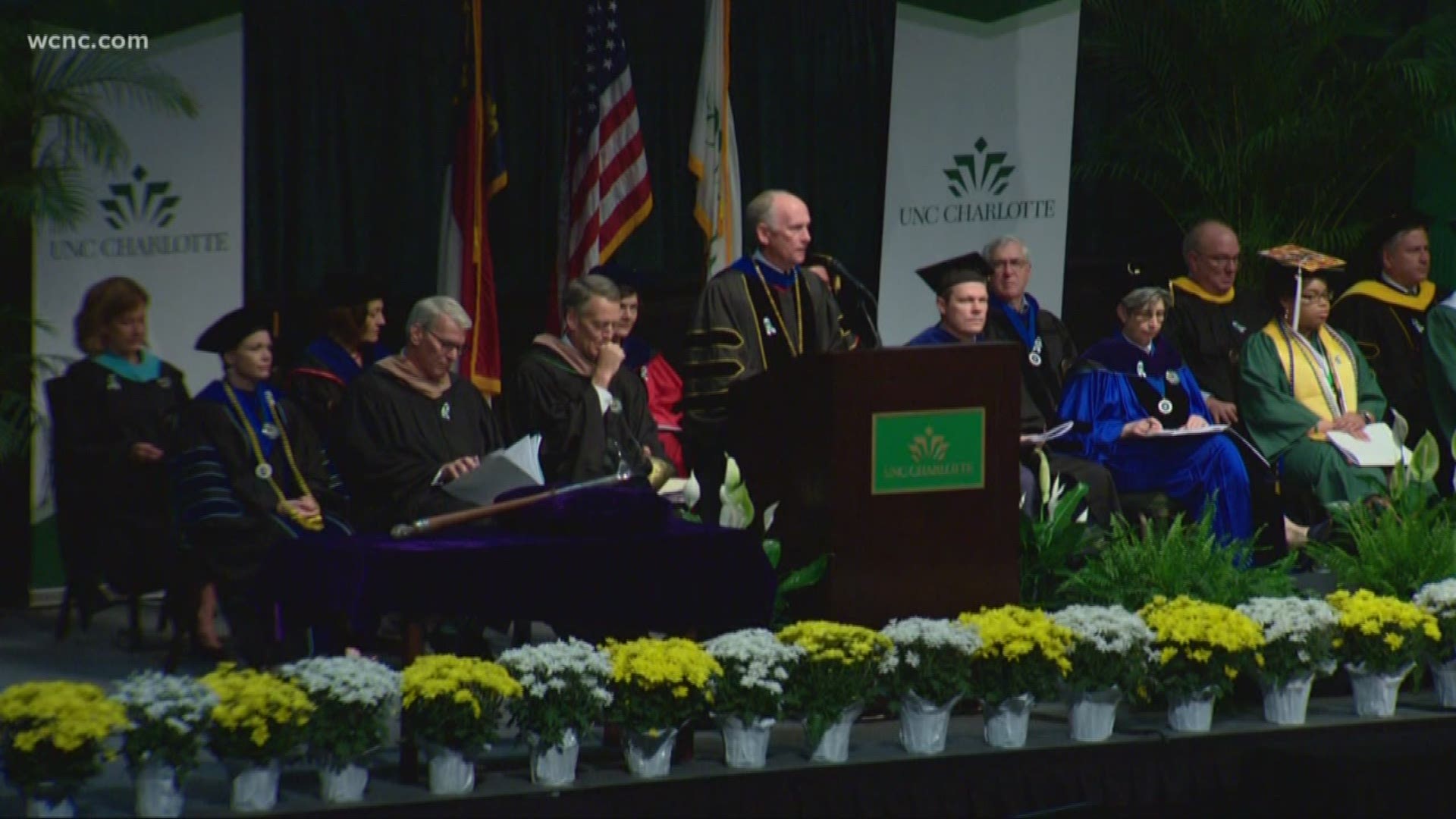 One of the survivors of the campus shooting was the first to walk across the stage. She received a standing ovation.