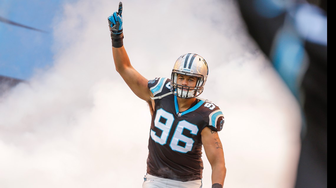 Carolina Panthers defensive end Wes Horton (96) grabs a fumble by