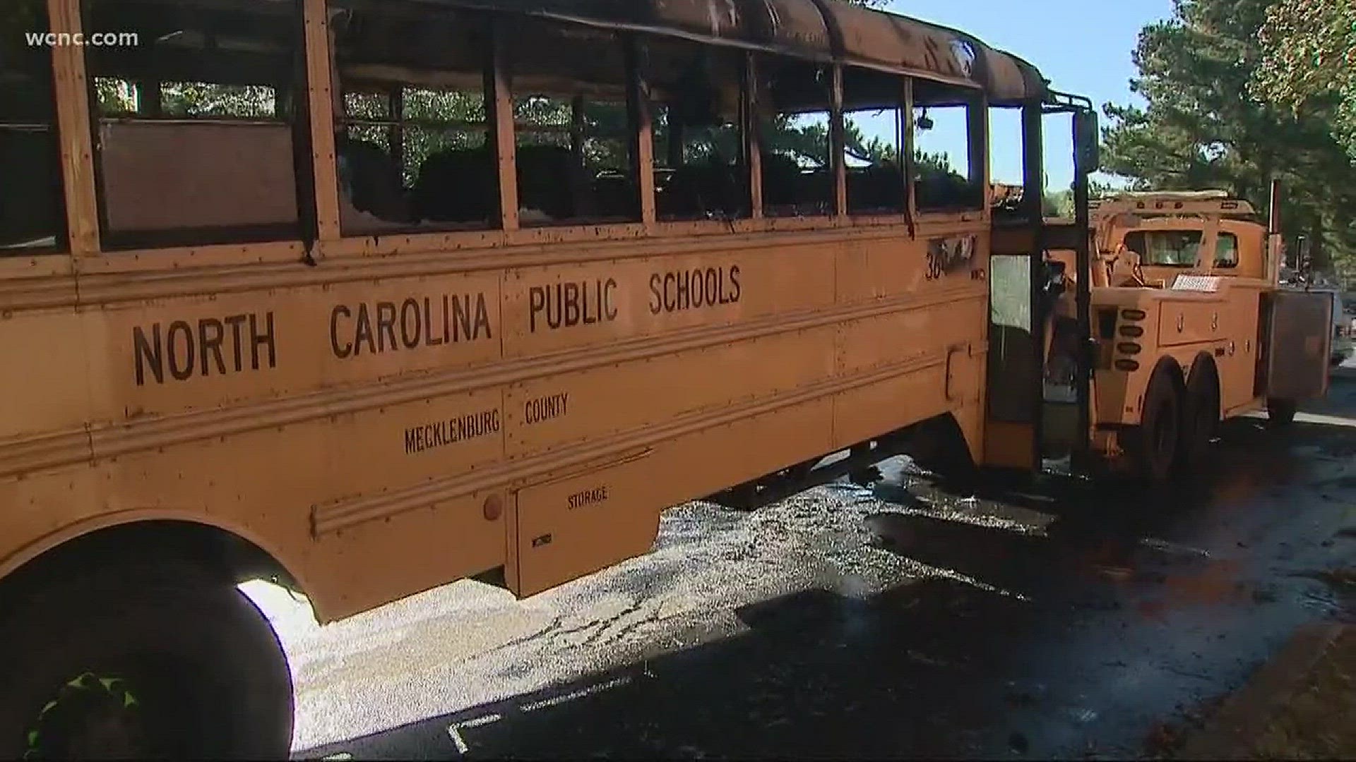 Charlotte-Mecklenburg Schools launched an investigation after a bus caught fire in east Charlotte Thursday afternoon.