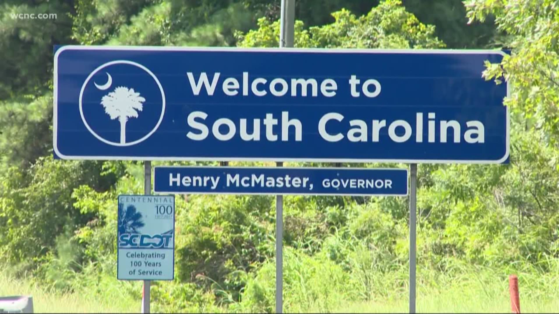 South Carolina Gov. Henry McMaster puts on a Carolina Panthers hat