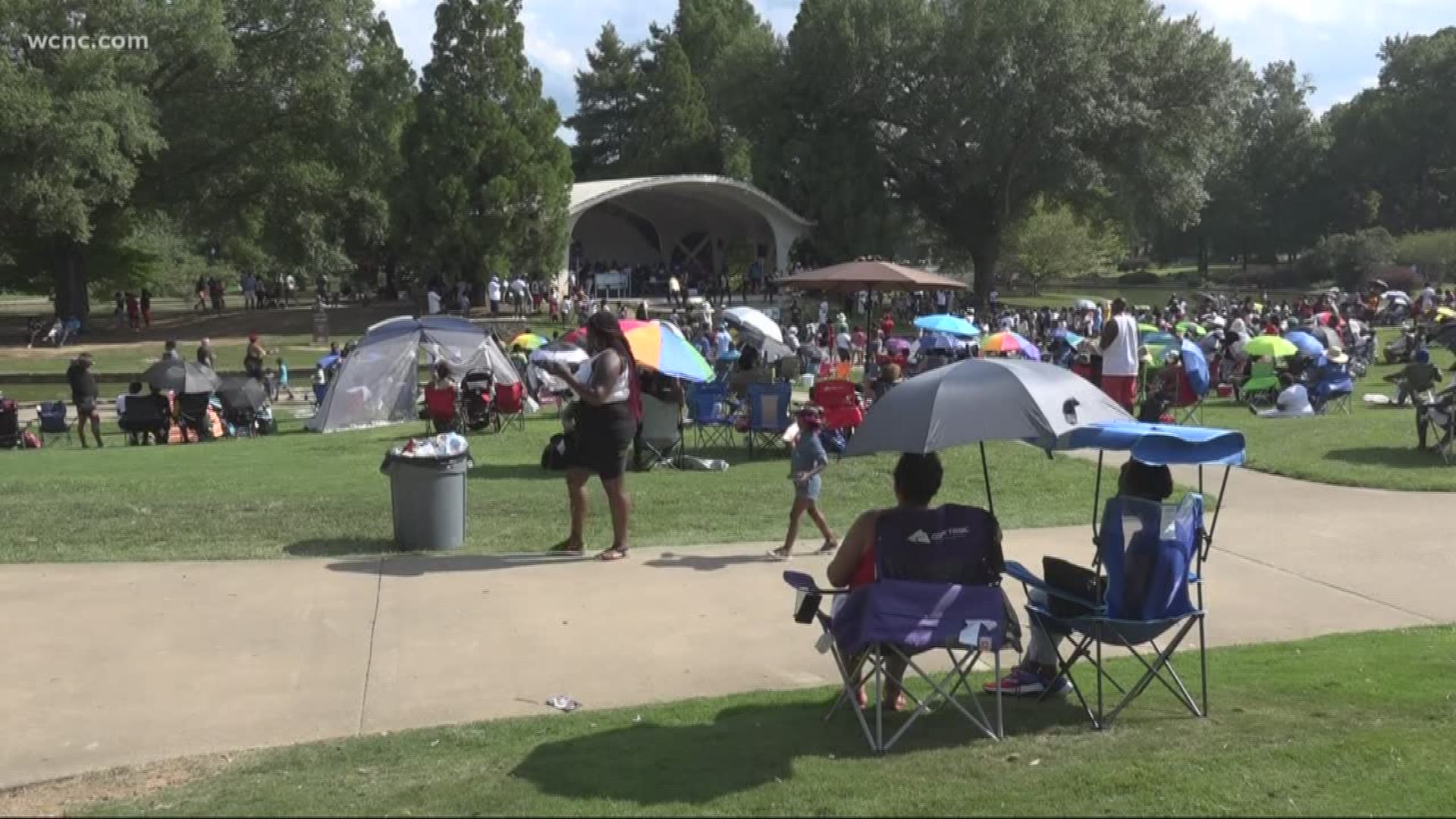 An event called "Charlotte Day", organized by the United Neighborhoods of Charlotte, was being held at the park to celebrate community unity.