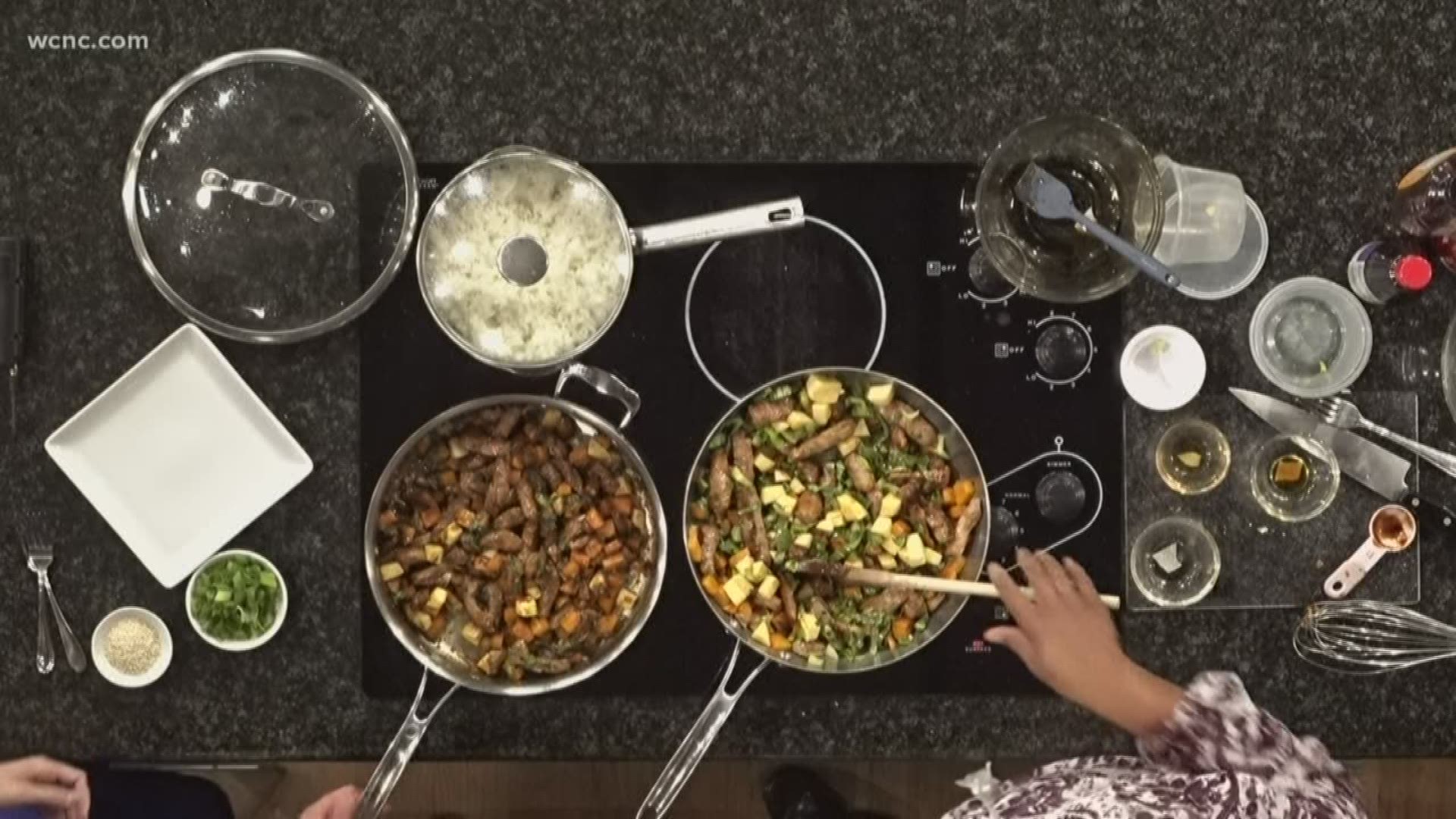 Cooking in the kitchen with Chef Andria from Queen City Kitchen.