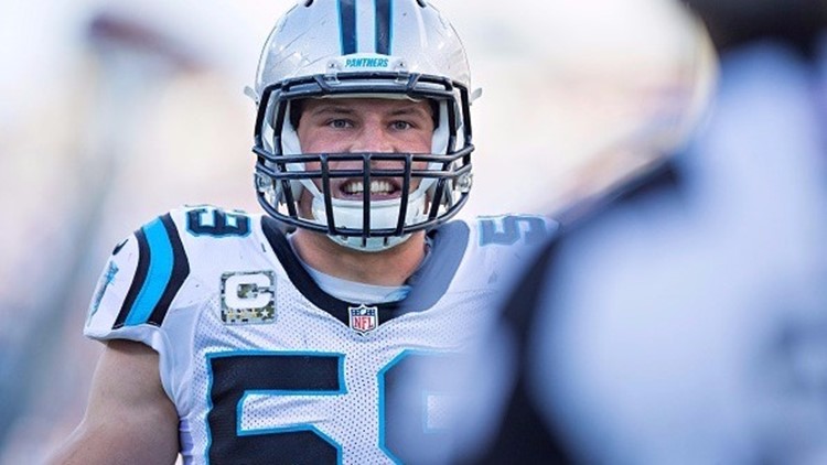 Carolina Panthers' Luke Kuechly #59 walks off the field against