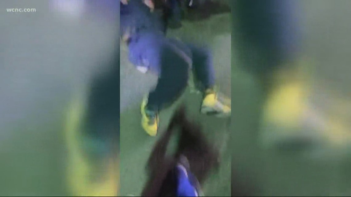 A Facebook live stream shows the man approach deputies at a football game. He walks up to ask why one of his sons was arrested at the front gate.