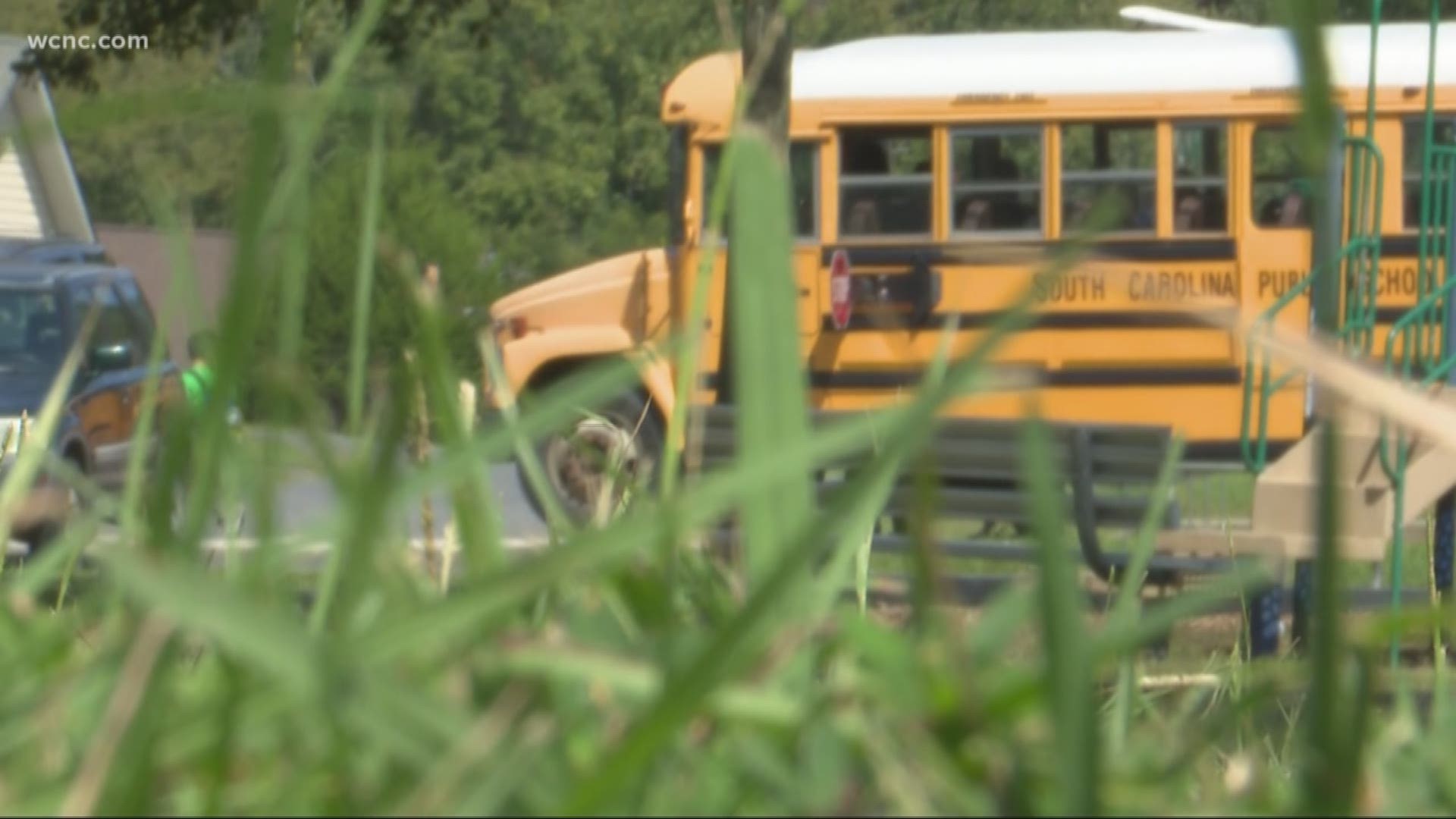 A mother is demanding the Rock Hill School District pay for her children's medical bills after she says her sons were hurt on the school bus.