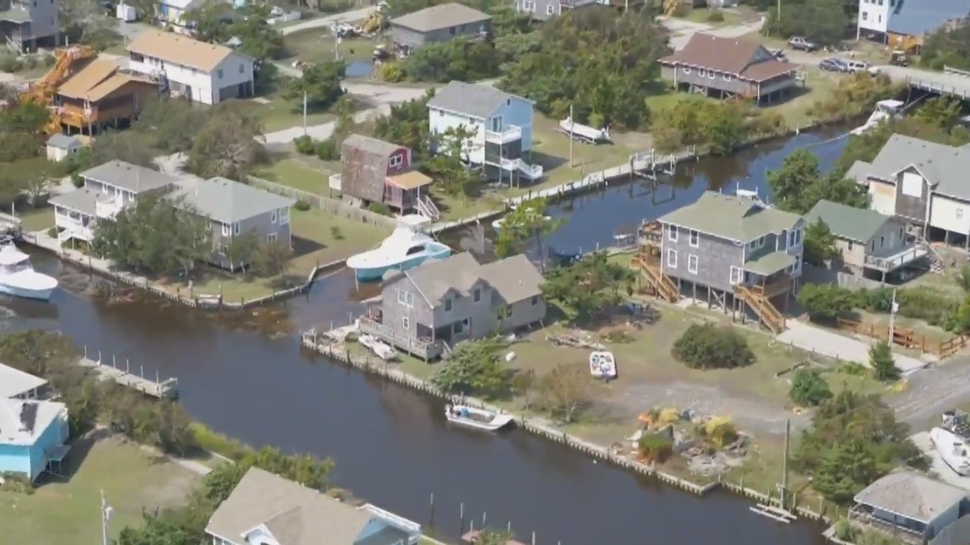 Dorian's storm surge and heavy rain triggered flooding in communities still recovering from the devastation left by Hurricane Florence last year.