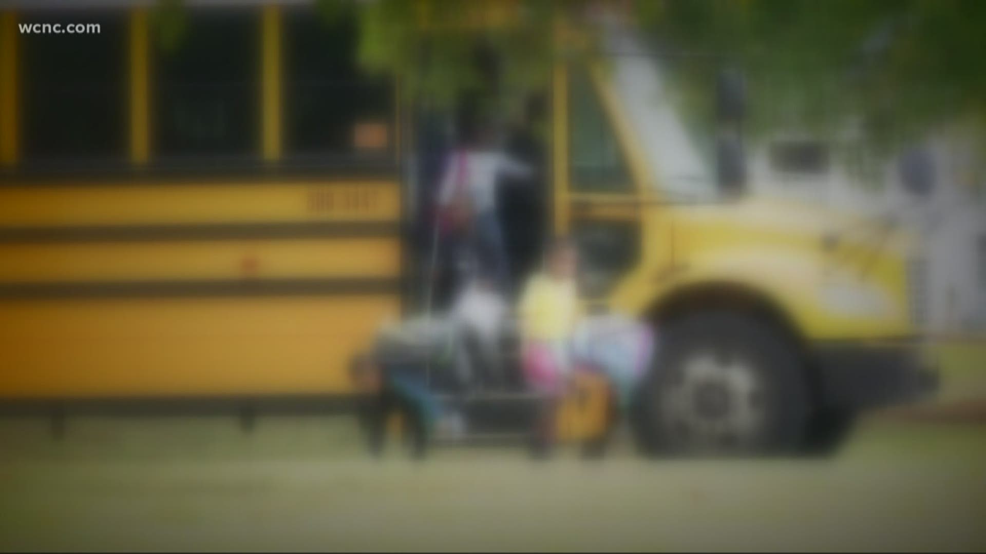Police said the unknown man grabbed one of the girls by their backpacks as they were walking home from school on Tuesday.