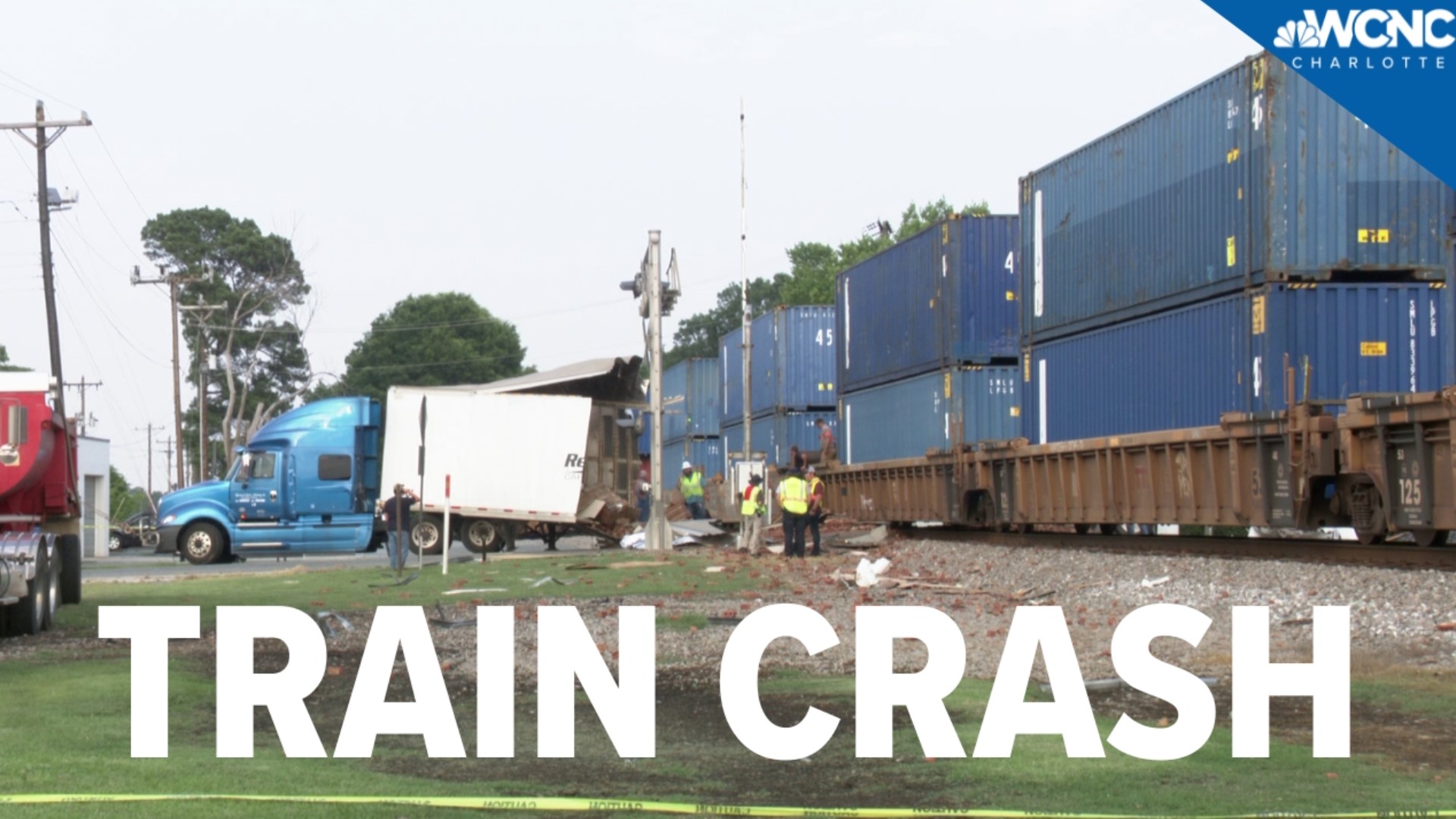 A tractor-trailer was struck by a train after getting stuck on the tracks on Thursday.