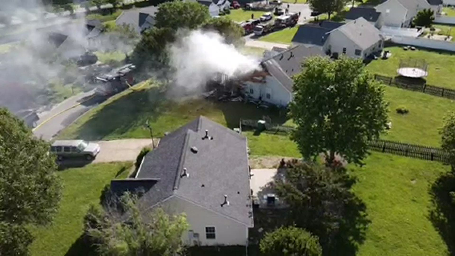 Crews are battling a house fire in Huntersville