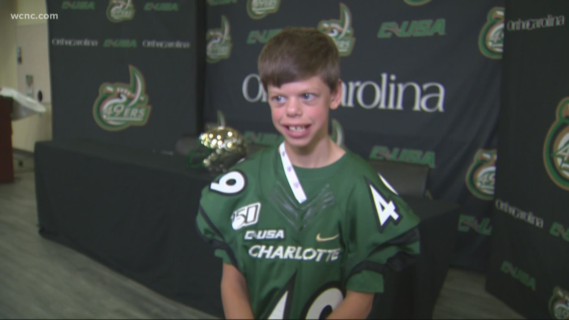 An 11-year-old with a genetic condition is the latest prospect for the Charlotte 49ers, and though he may not take the field, the 49ers are positive he'll make an impact.