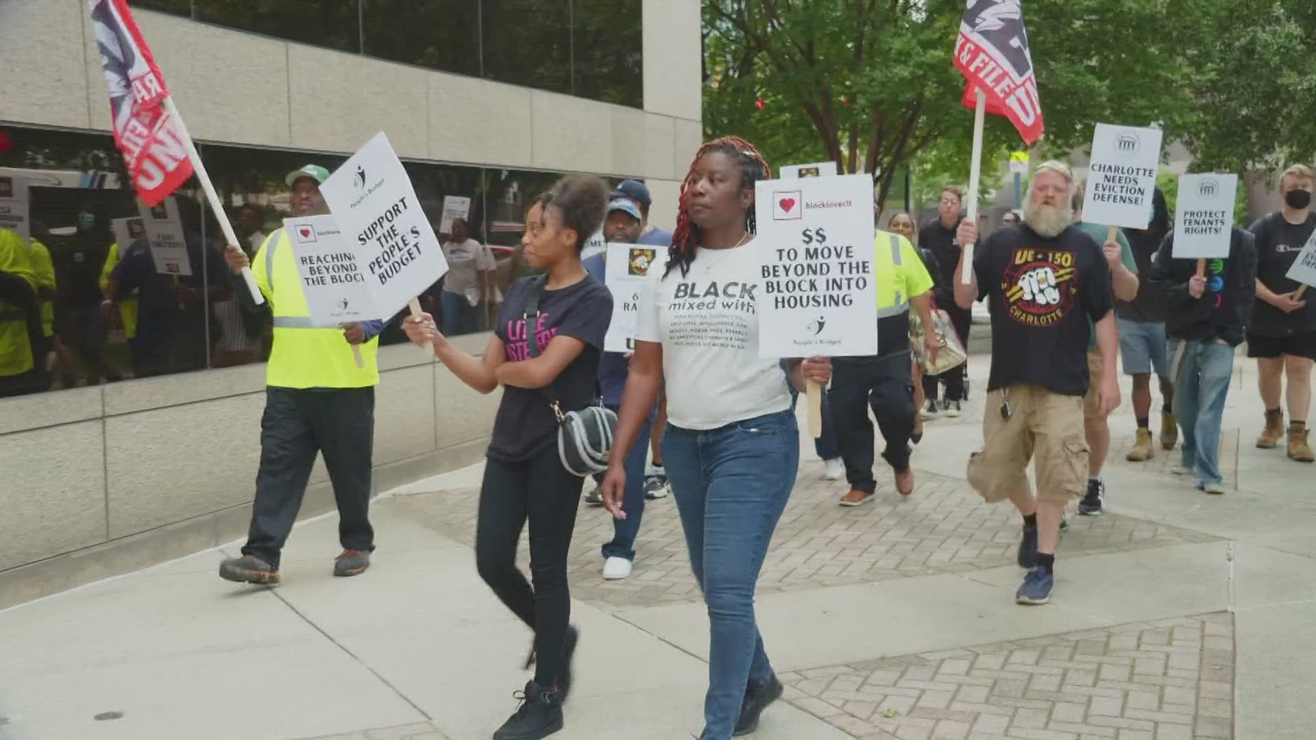 City workers rallied outside Monday's Charlotte City Council meeting as they push leaders to make their salaries a priority with the new budget.