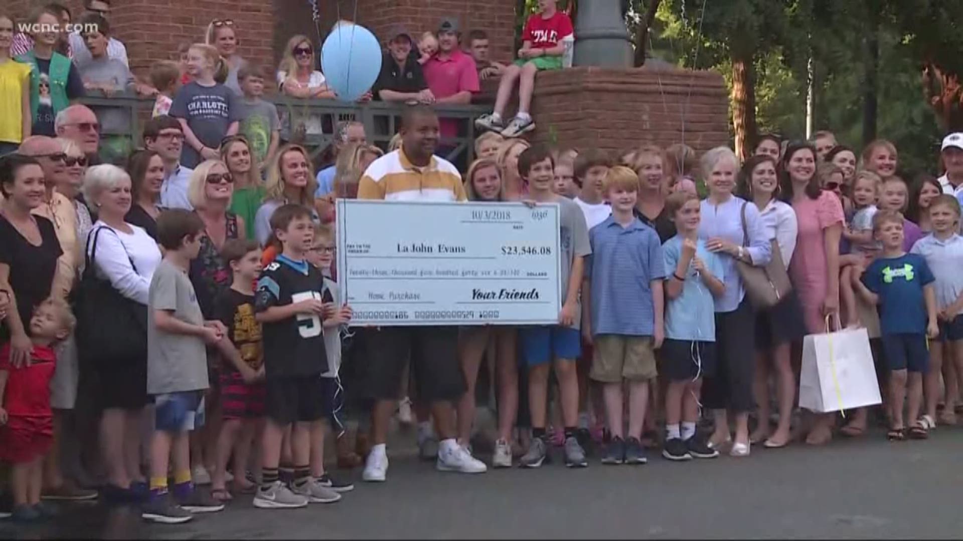 La-John Evans has been saving money to buy a house. So a group of women started a secret fundraiser to help him out, raising more than $20,000 in 10 days.
	they presented him with the check today.