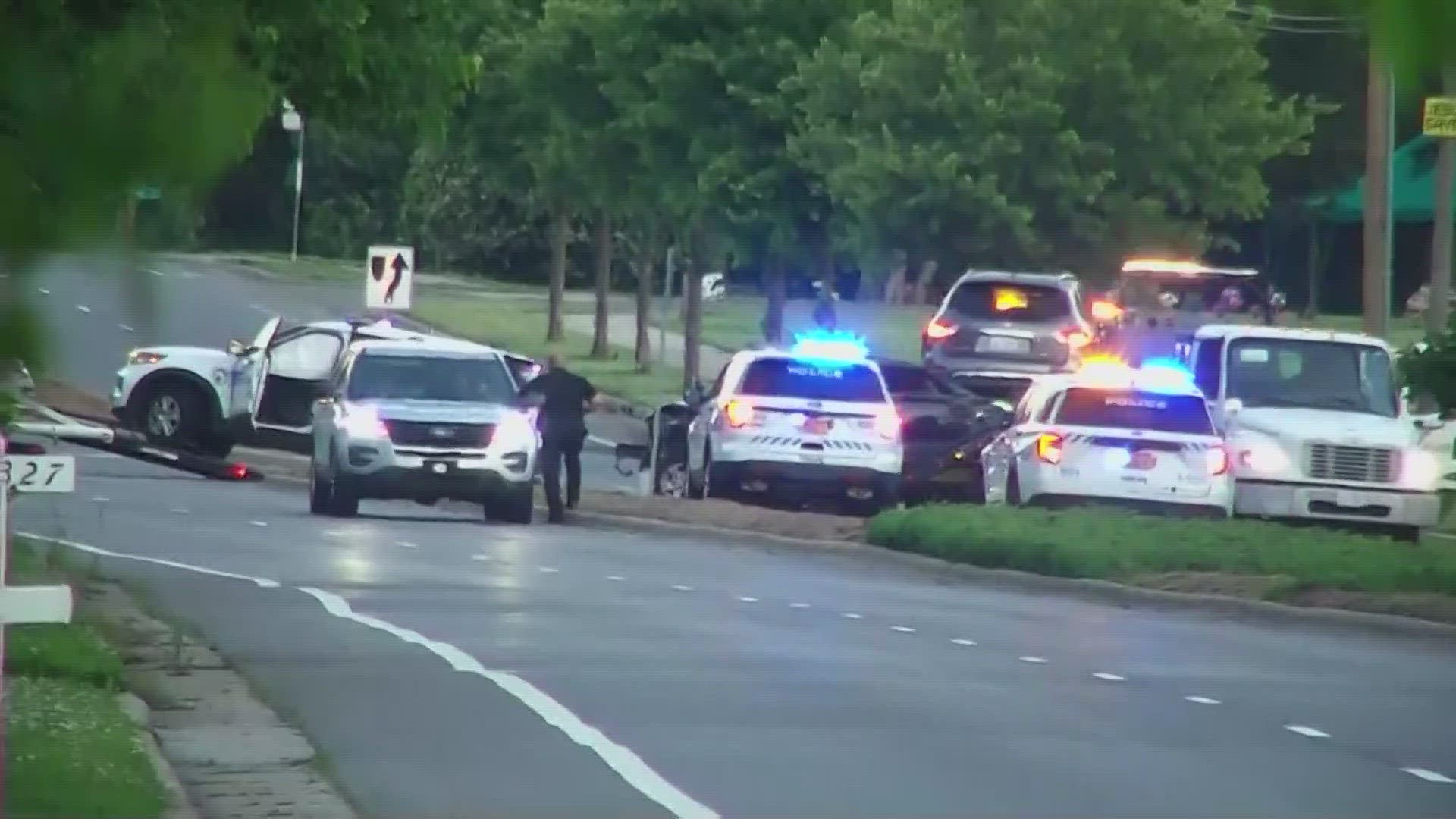 A Charlotte-Mecklenburg police officer was taken to the hospital when his cruiser was hit by another vehicle on Freedom Drive Monday morning, police said.