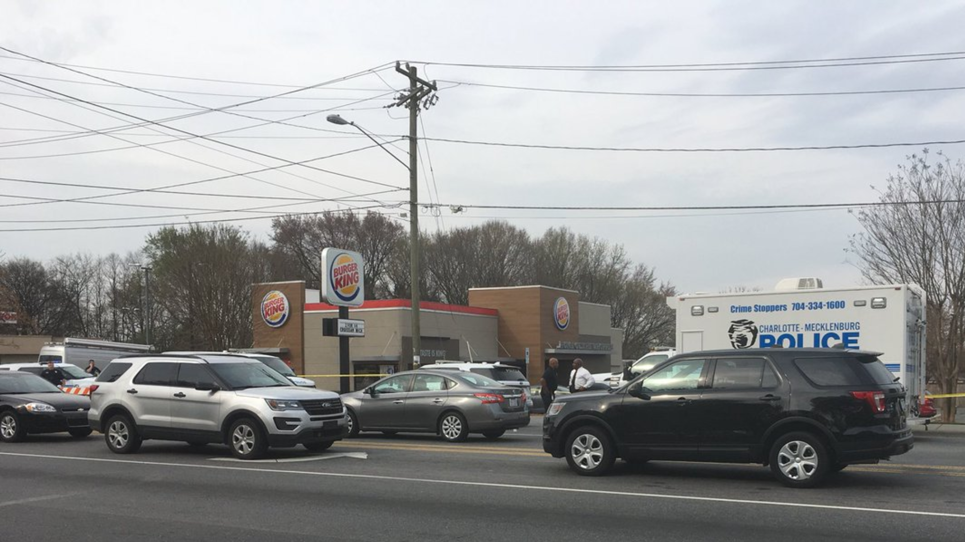 Charlotte-Mecklenburg Police are investigating after detectives said an armed man was shot and killed by an officer in the parking lot of a Burger King restaurant in north Charlotte Monday morning.