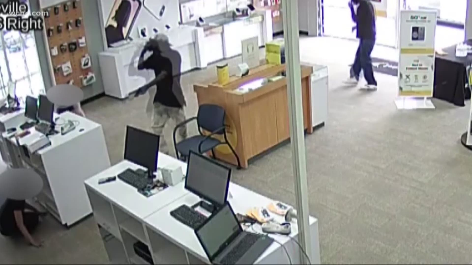 The Pineville Police Department's searching for the suspect's accused of robbing a Sprint store Monday morning.