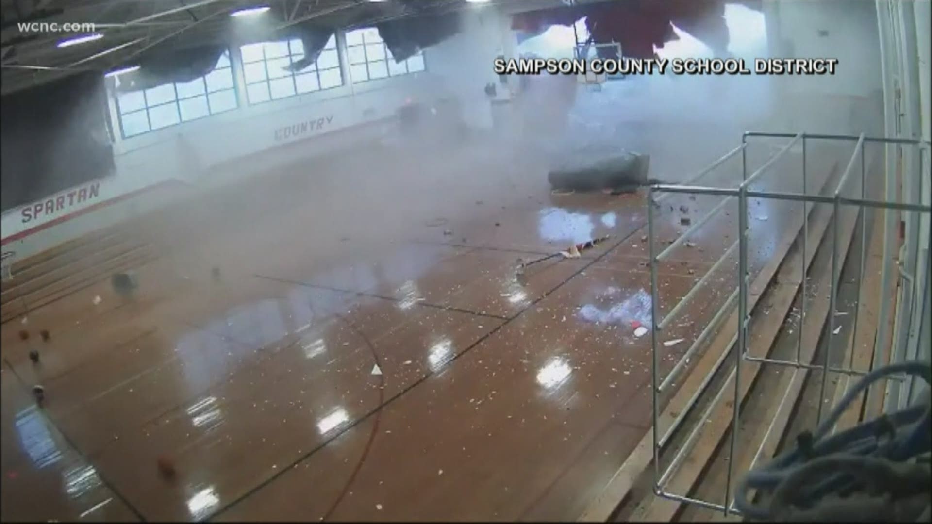 Video shows the moment a roof collapsed on students in a gym in Sampson County. You can see the students on the basketball court when the stage curtain blows upward.