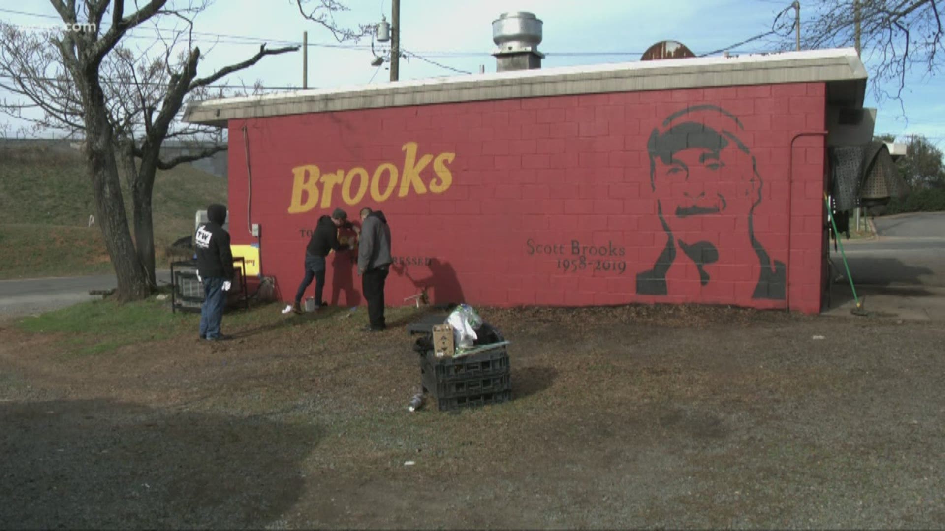 The mural is on the back of Brooks' Sandwich Shop, along with Brooks' commonly used phrase "too blessed to be stressed."