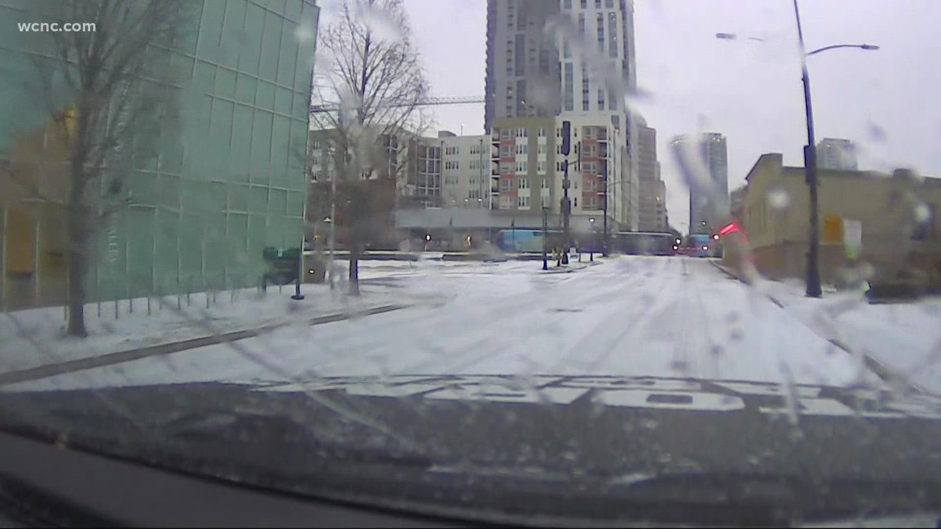 The winter storm is causing messy conditions on Charlotte roads with a mix of snow, sleet and ice covering the streets.