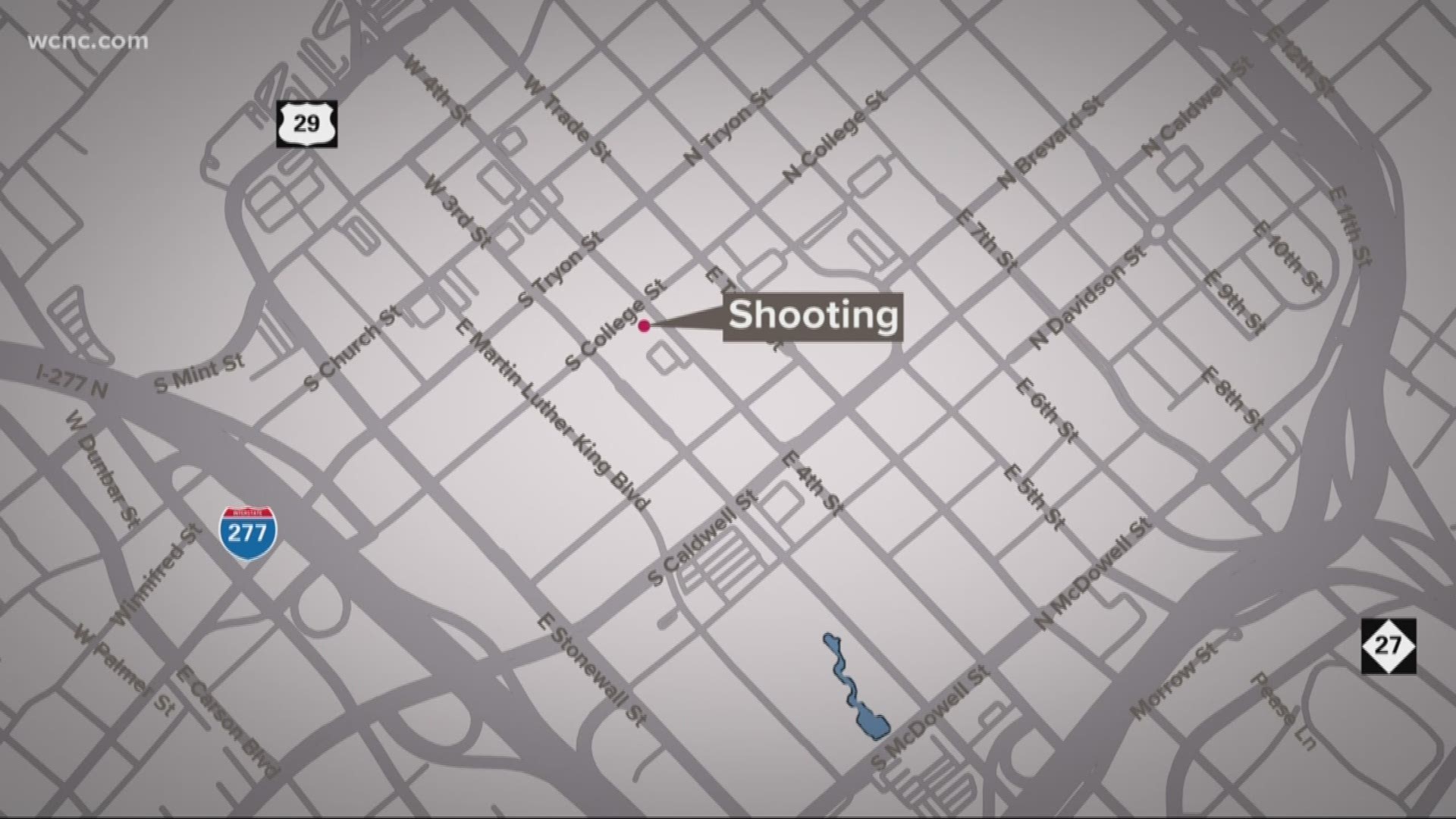 Police said two men were fighting near a parking garage when a third person nearby shot one of them.