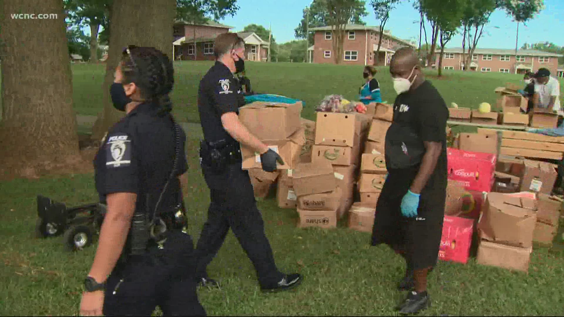Hamilton and his foundation helped clean up a Charlotte neighborhood then give away free food and masks to the community.