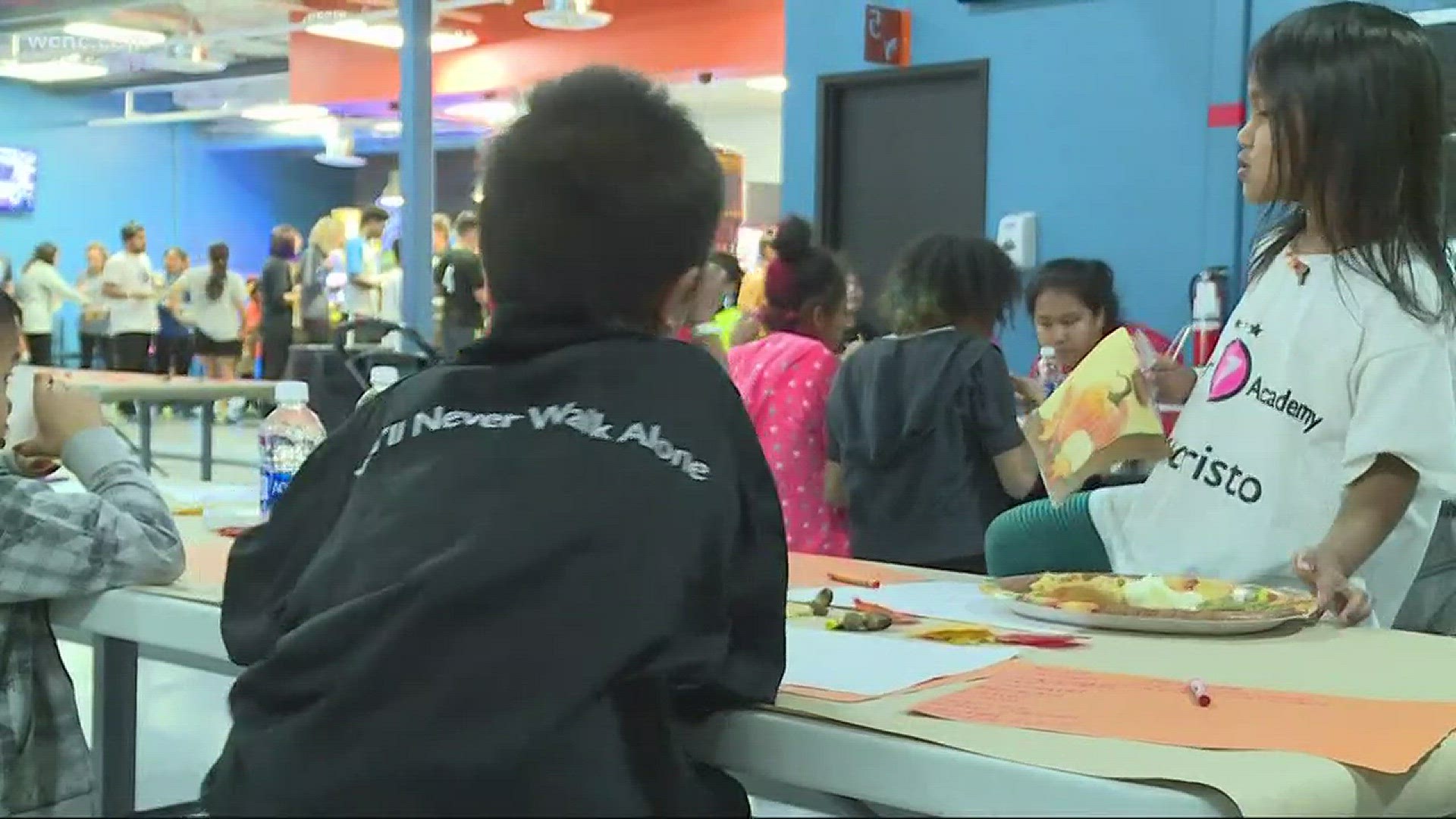 Local business gives 130 foster kids and refugees a thanksgiving they'll never forget