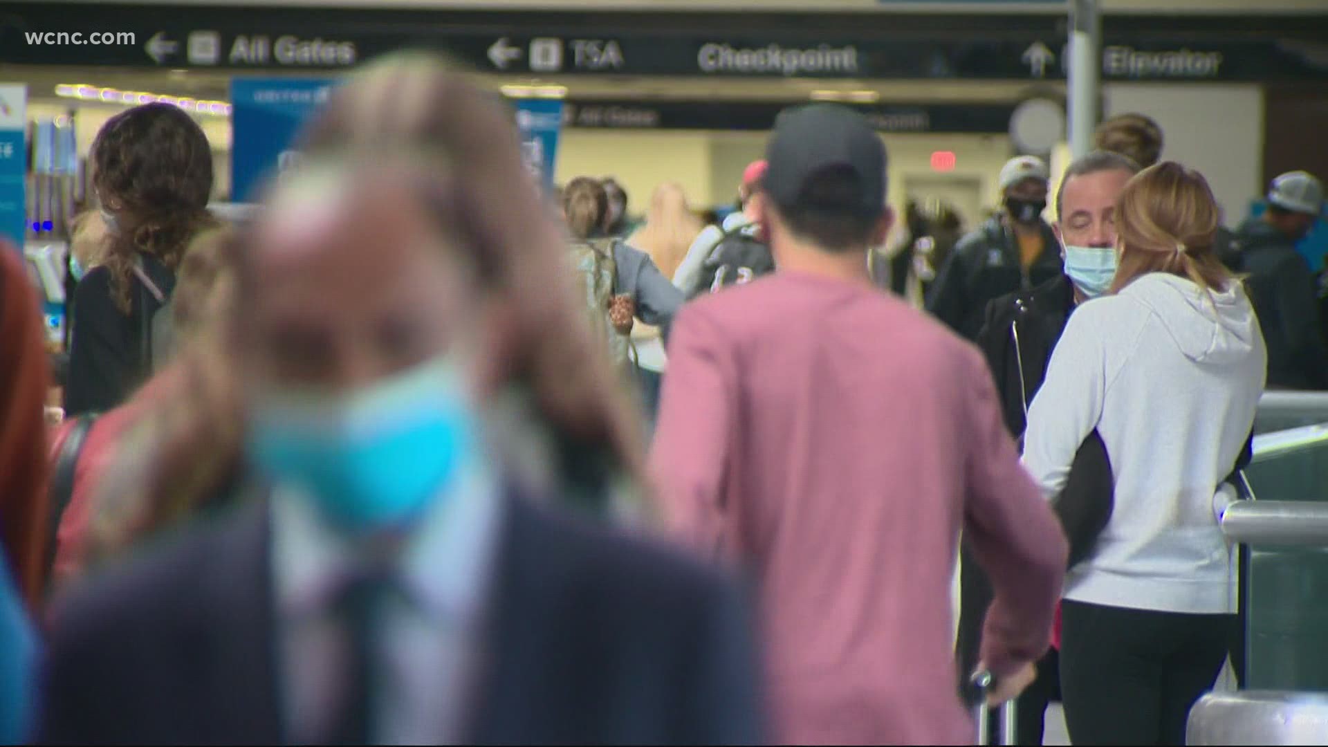 On Sunday, travelers continued to arrive for departures even as North Carolina reported a record high of 4,514 new coronavirus cases in a single day.