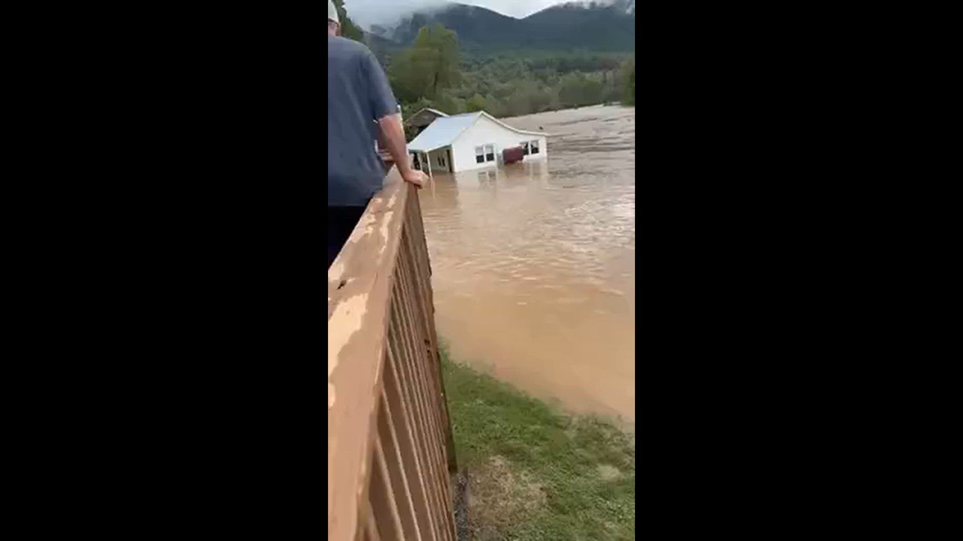 The North Fork of the New River floods a backyard in Warrensville, North Carolina
Credit: Lorena Farmer