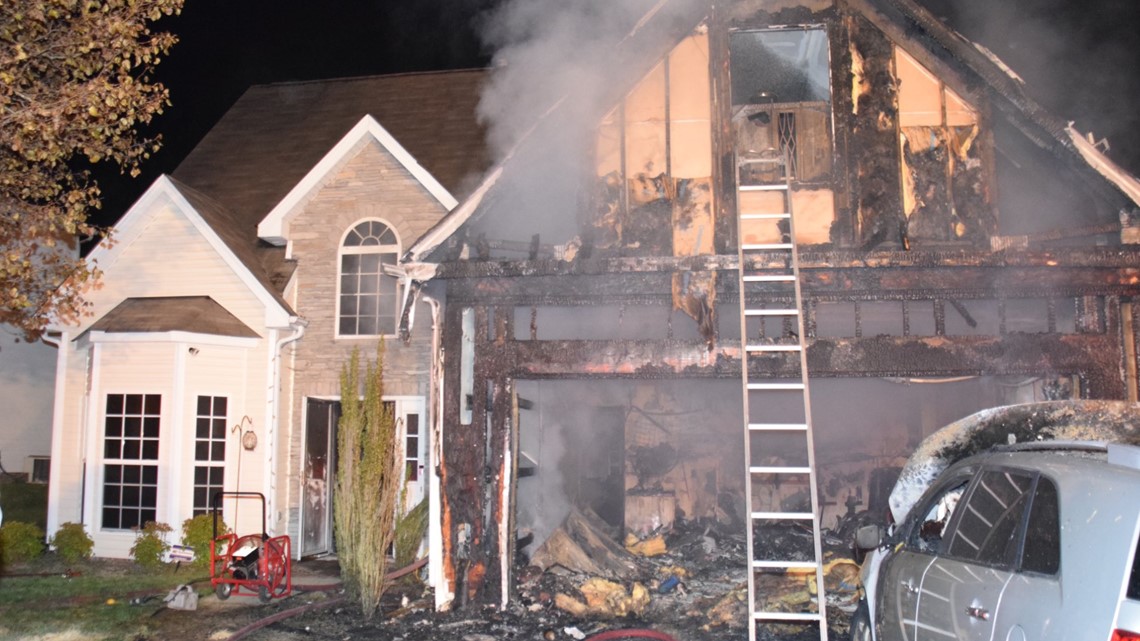 Nine people, family dog safe after Charlotte Fire puts out house fire