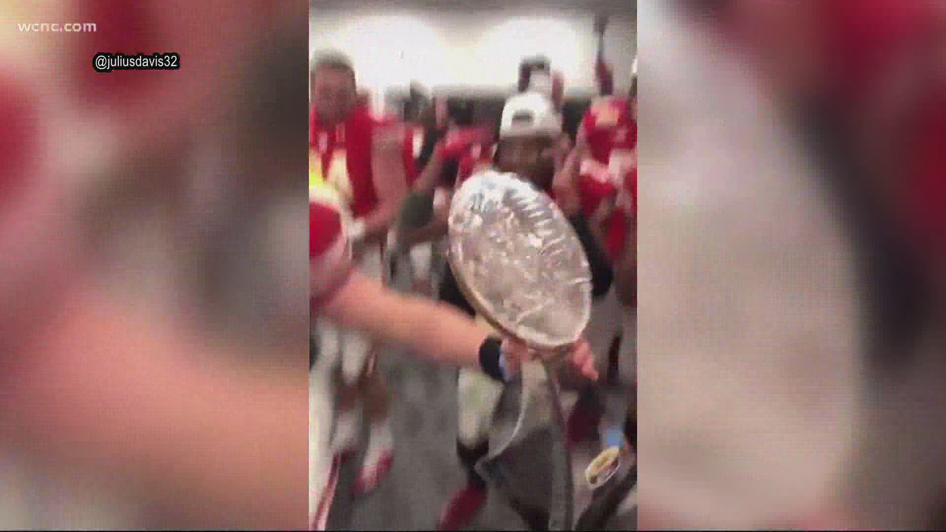 QB Graham Mertz dropped the crystal trophy while dancing in the locker room.