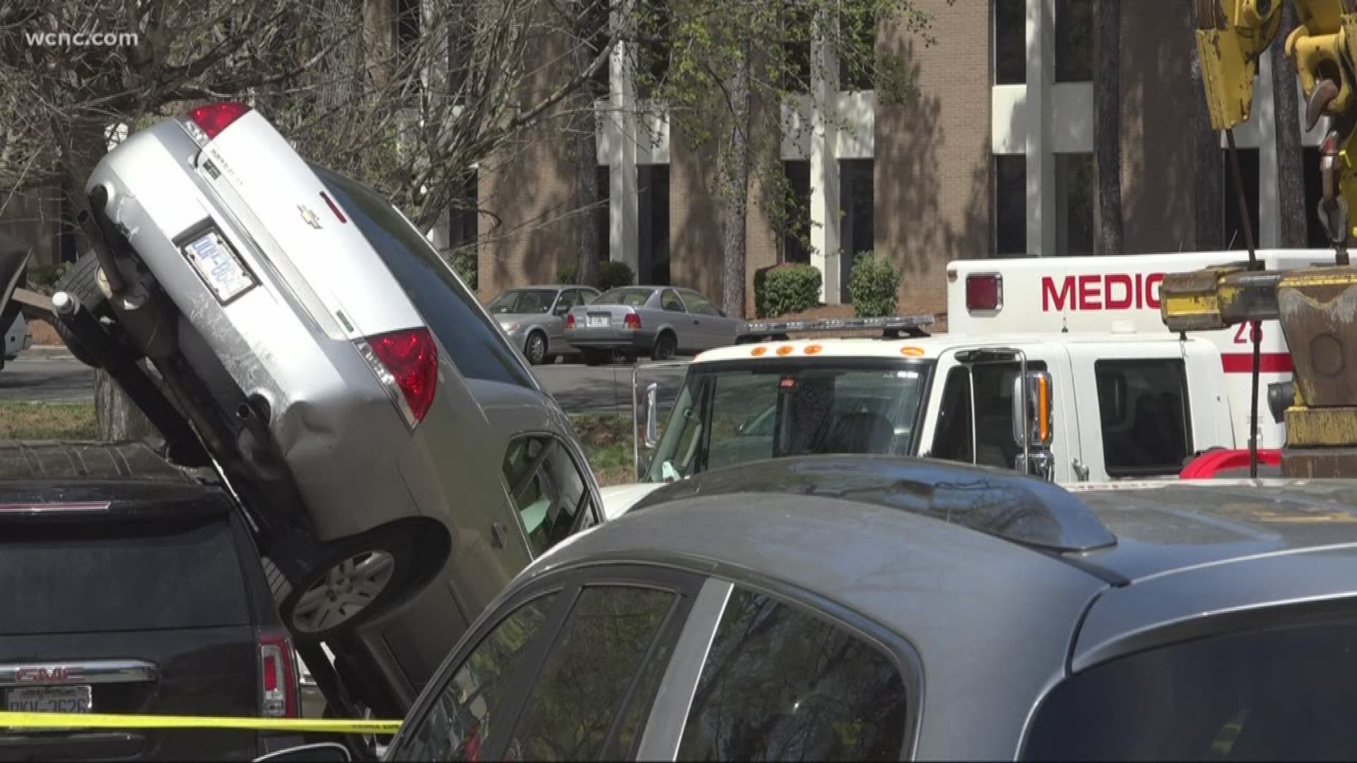 In the video, you can see the ambulance lunge forward and push two cars into other vehicles in a parking lot.