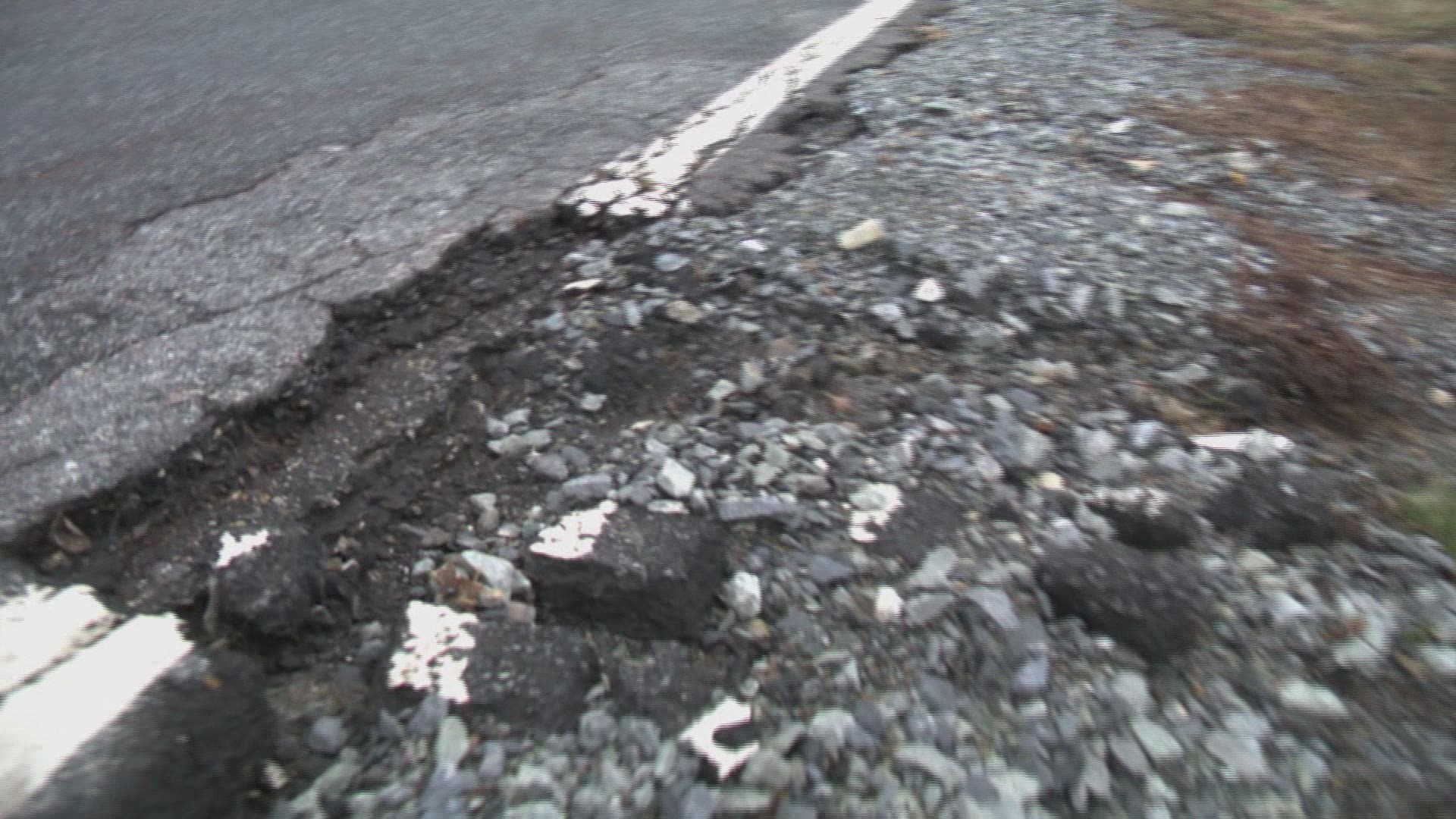 After record rainfall over the weekend in some mountain counties that damaged roads, Tuesday's rain made it tough for crews to make repairs on schedule.