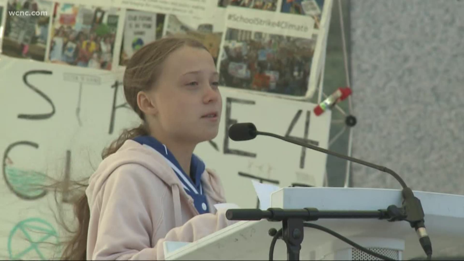 The crowd outside the government center interrupted the 16-year-old climate activist several times with applause as she said humanity is now at a crossroads.