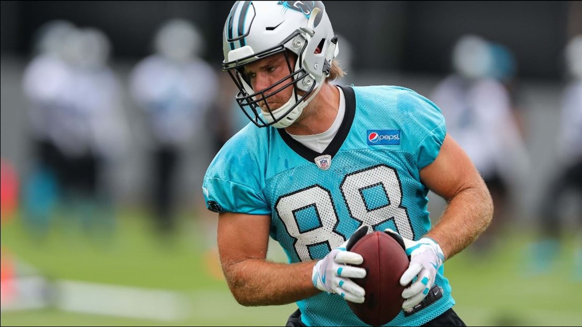 Carolina Panthers tight end Greg Olsen (88) stands on the sideline as the Panthers  play the Los Angeles Rams in the second half of an NFL football game in  Charlotte, North Carolina