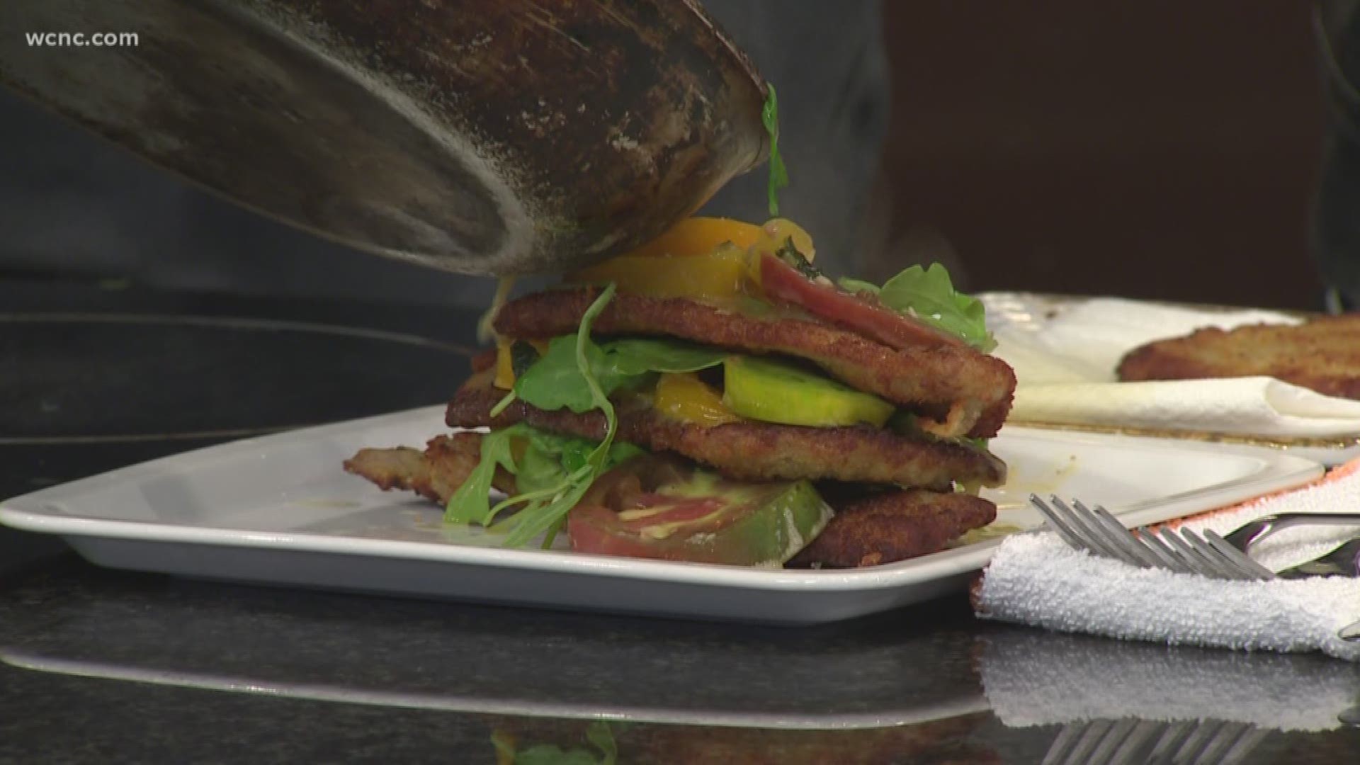 Executive chef of Legion Brewing, Gene Briggs, shows us how to make pork Milanese with pomegranate and arugula.