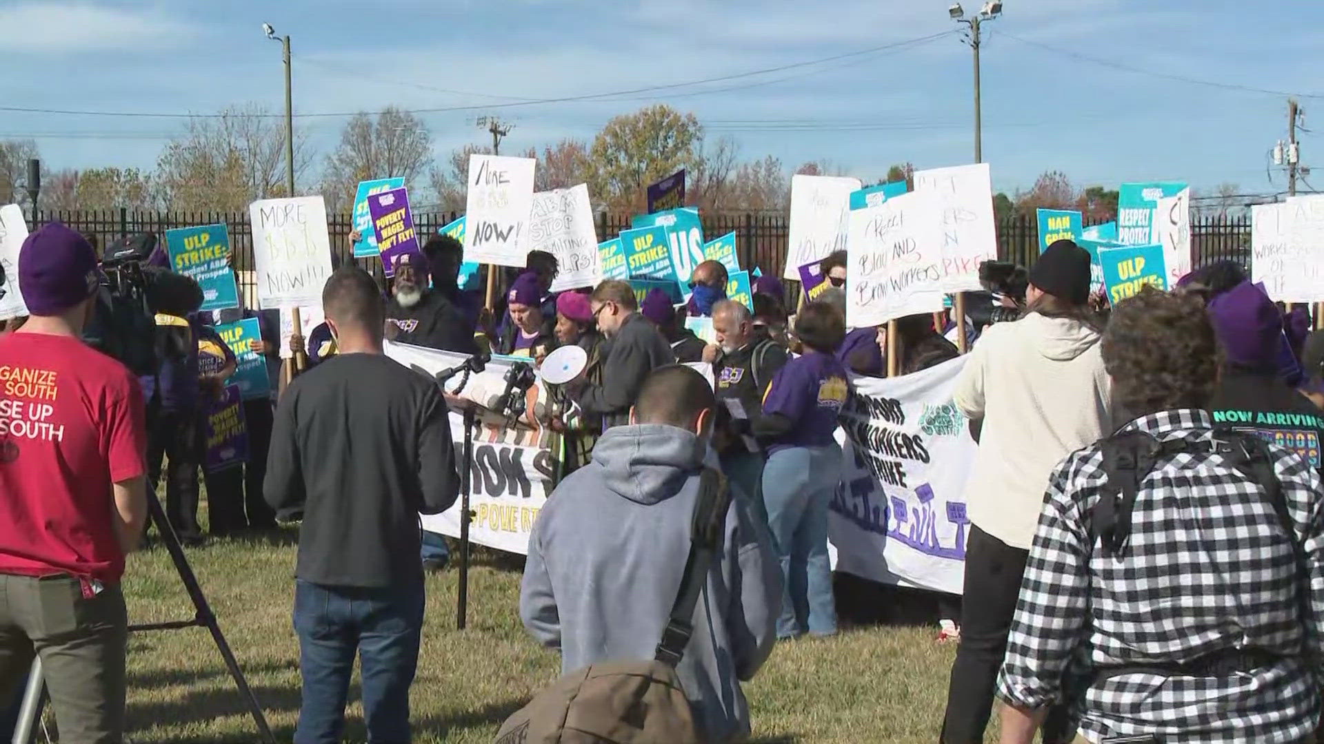 Dozens of airport workers are on strike during one of the busiest travel weeks of the year.